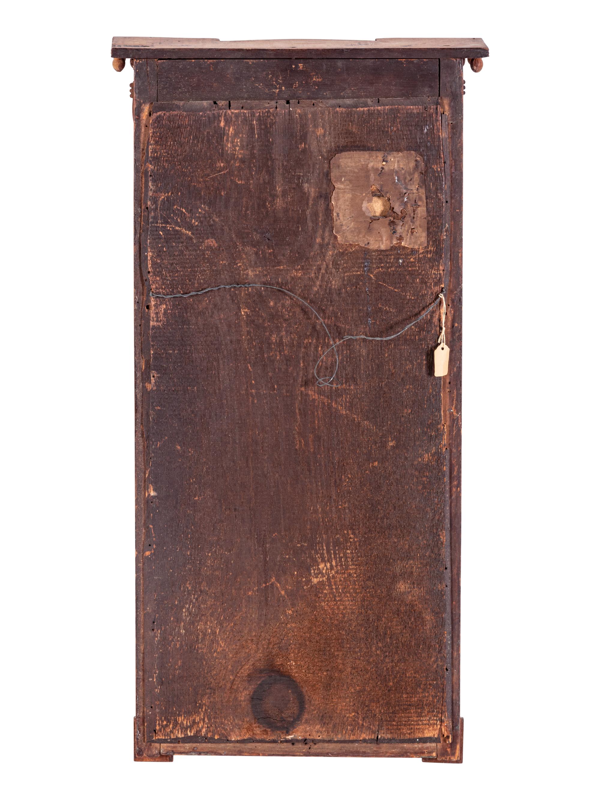 A Classical Spiral-Twist Carved Walnut and Églomisé Looking Glass