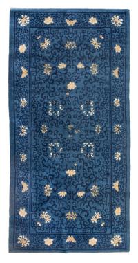 A Chinese Wool Rug Length 3 feet 1 inch x width 5 feet 9 3/4 inches.