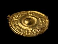 A Near Eastern Gold Disk Pendant