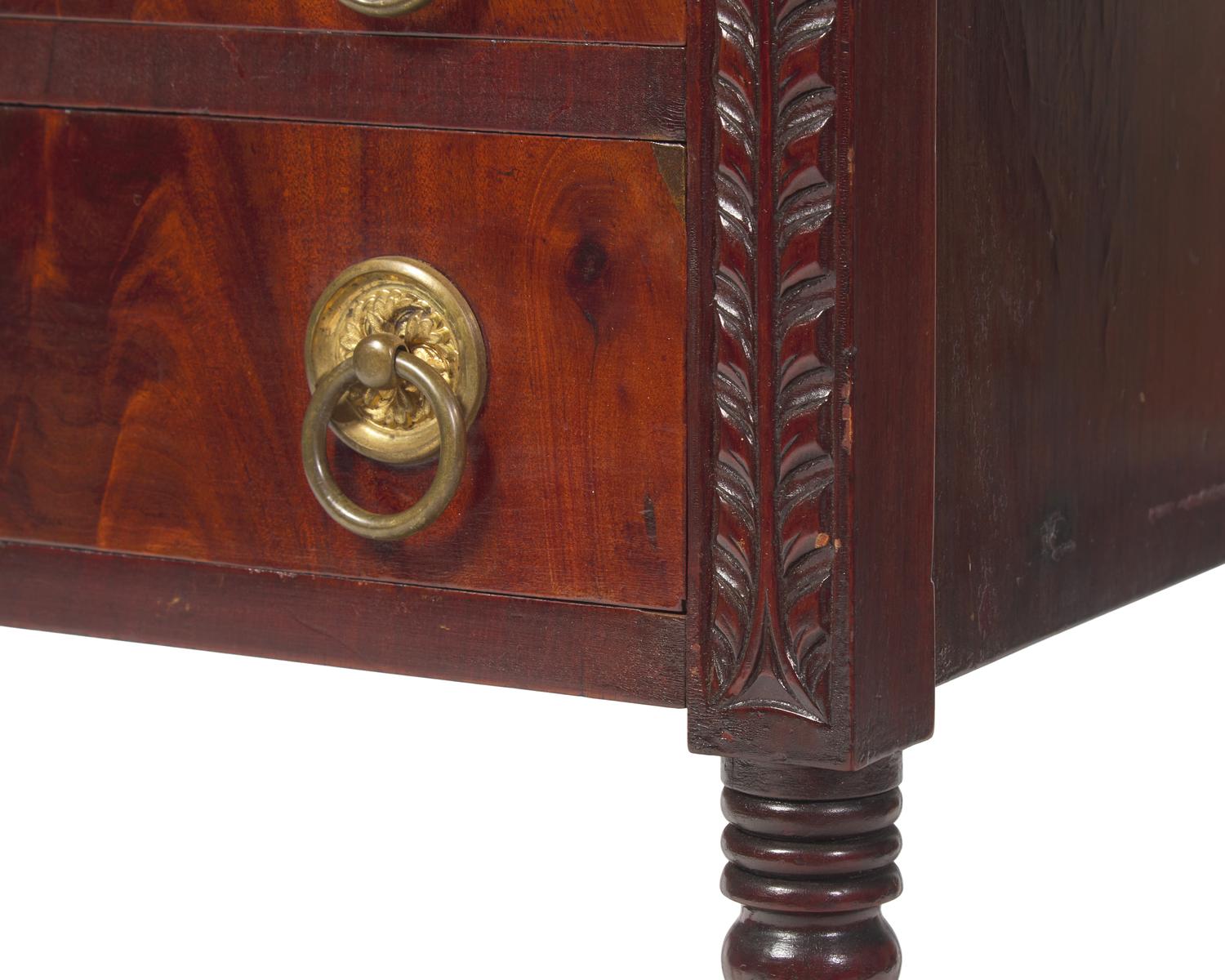 A Classical Carved Mahogany Two-Drawer Stand