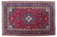 A Tabriz Wool Rug 9 feet 11 inches x 6 feet 7 1/2 inches.