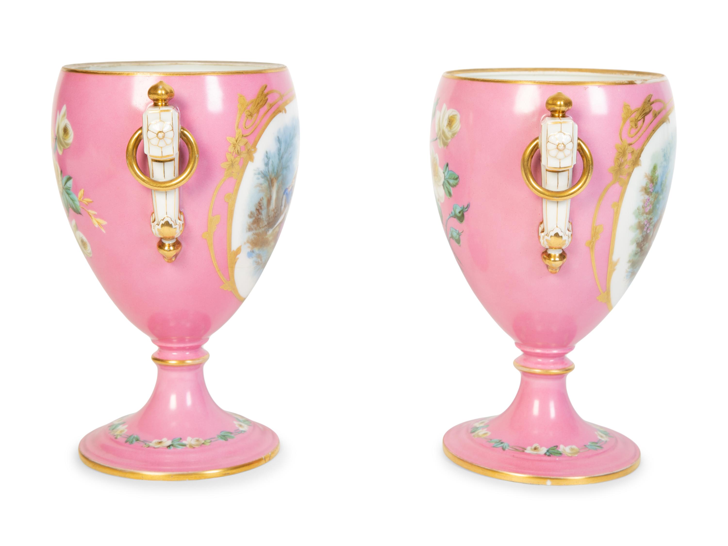 A Pair of Sèvres Style Porcelain Urns