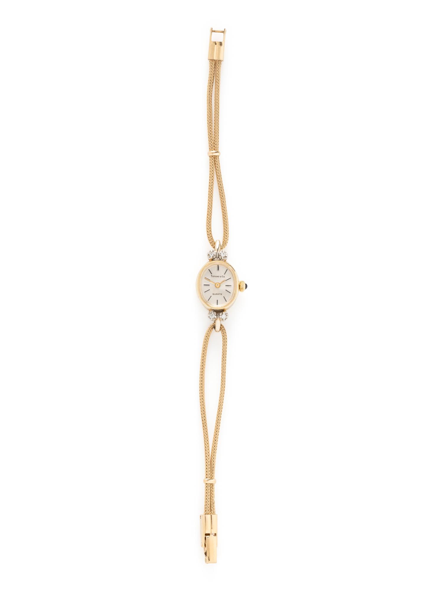 TIFFANY & CO., 14K YELLOW GOLD AND DIAMOND WATCH
