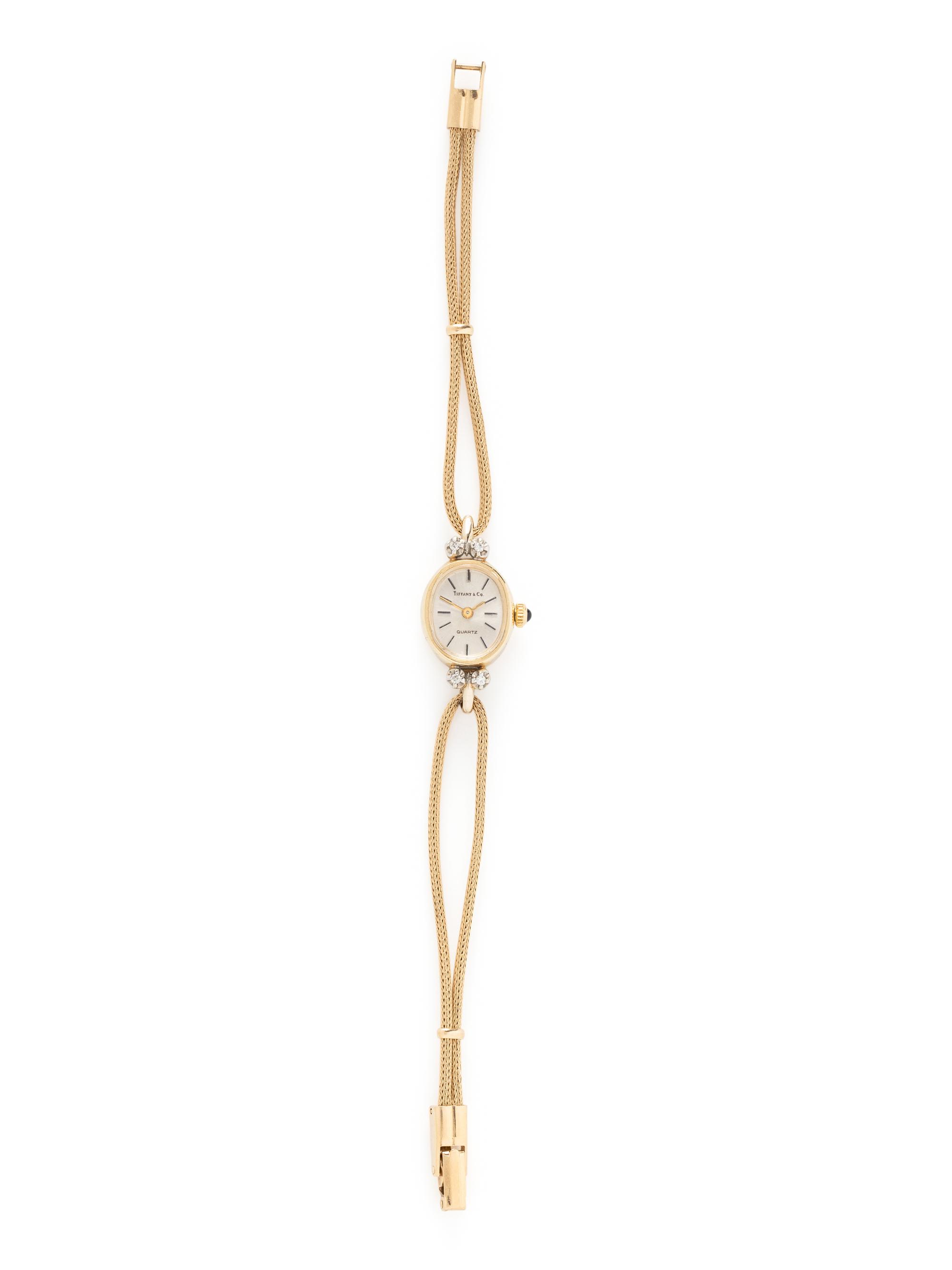 TIFFANY & CO., 14K YELLOW GOLD AND DIAMOND WATCH