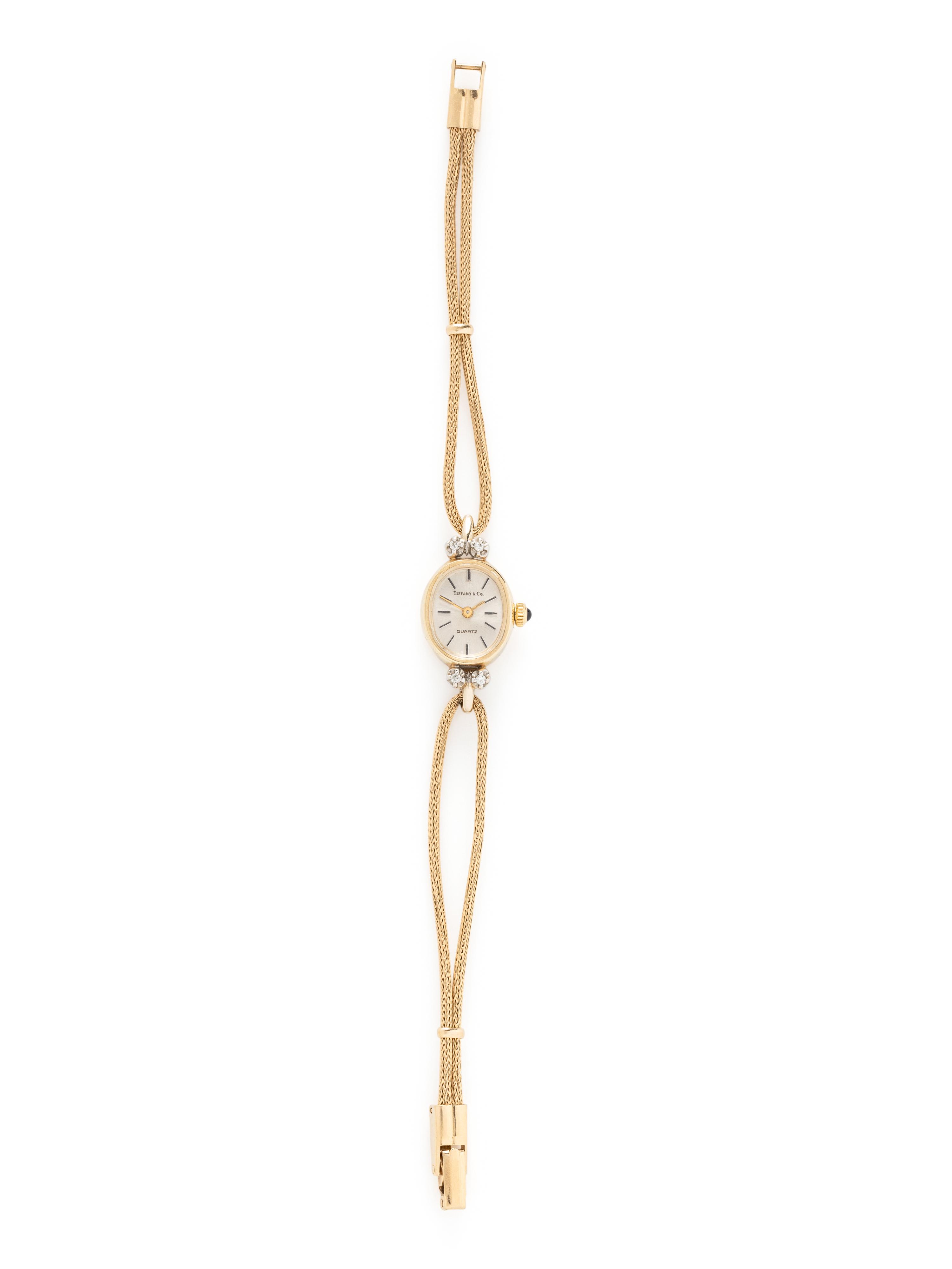 TIFFANY & CO., 14K YELLOW GOLD AND DIAMOND WATCH