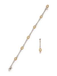 BICOLOR GOLD, DIAMOND, AND COLORED DIAMOND BRACELET AND PENDANT