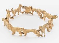 A 14K Yellow Gold Dog Bracelet