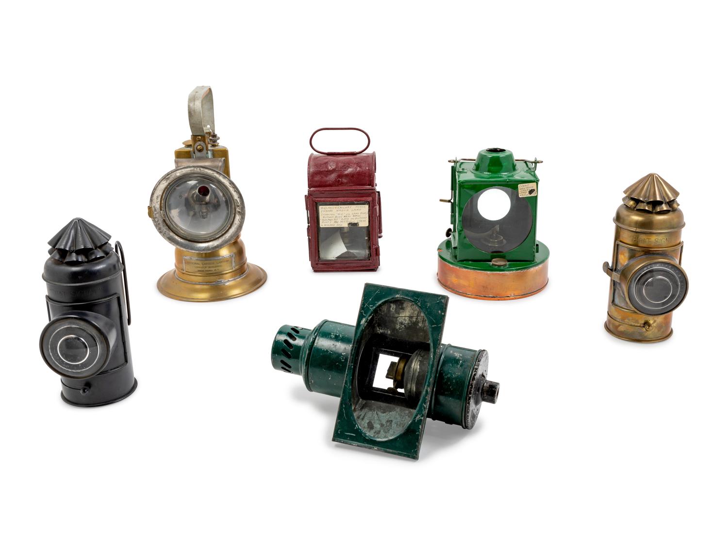 A Group of Six Chromed Metal Railroad Signal Lanterns