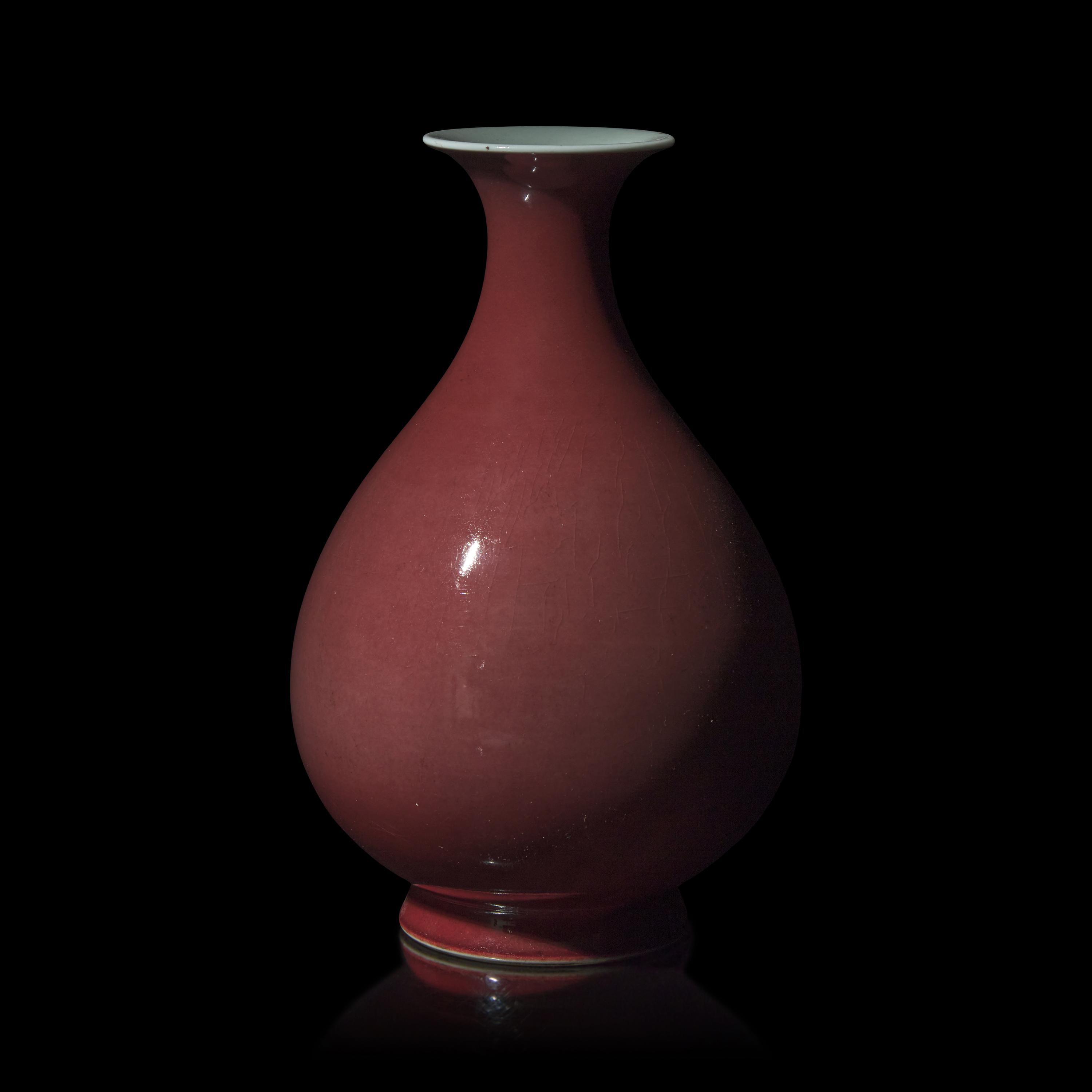 A Chinese Copper-Red Glazed Vase, Yuhuchun , Daoguang Mark and Period — 清道光 紅釉玉壺春瓶