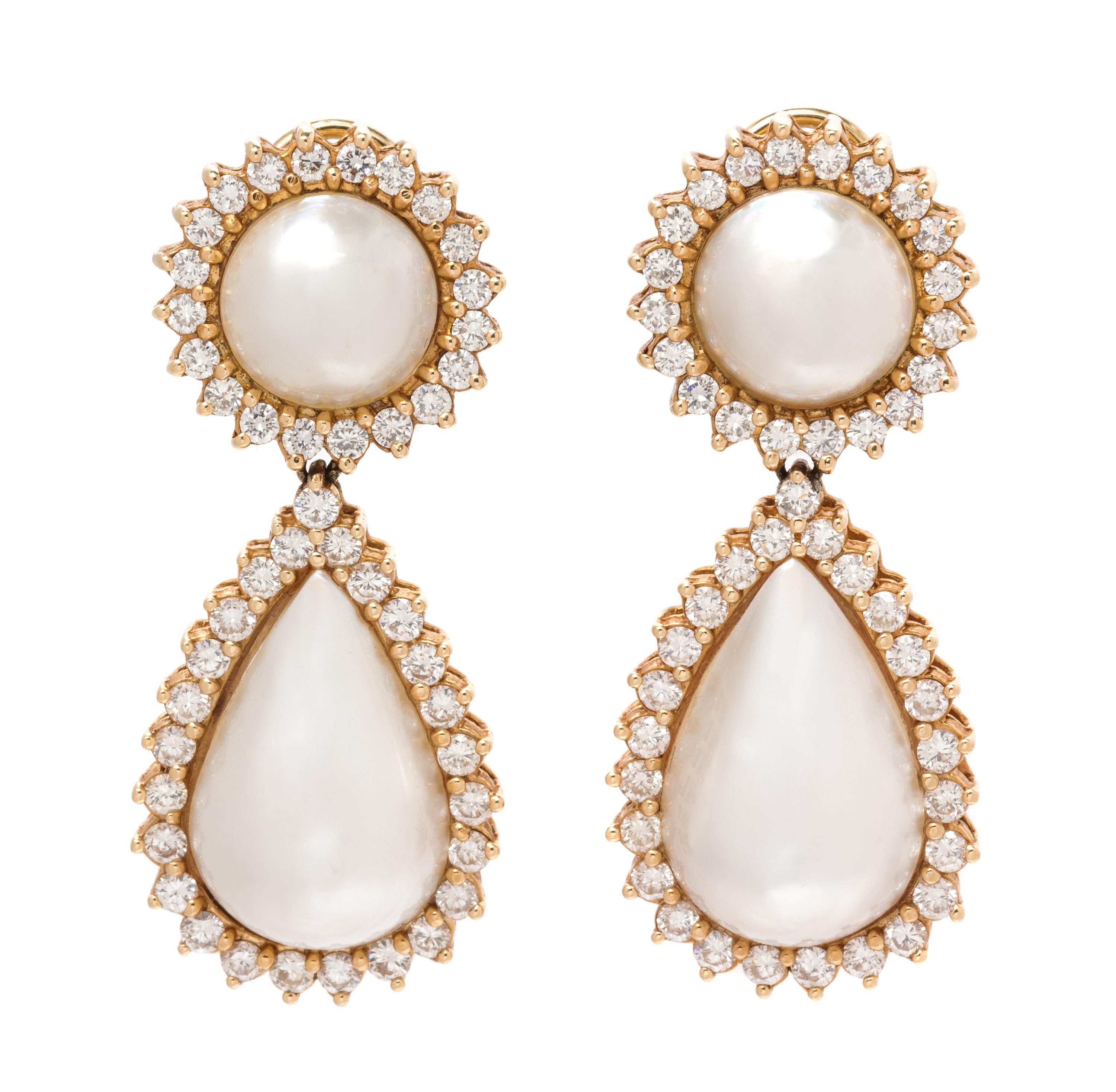 A Pair of Yellow Gold, Cultured Mabe Pearl and Diamond Earclips, 16.50 dwts.
