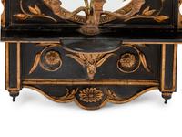 A Pair of English Parcel-Gilt and Ebonized Girandole Mirrors — 19TH CENTURY