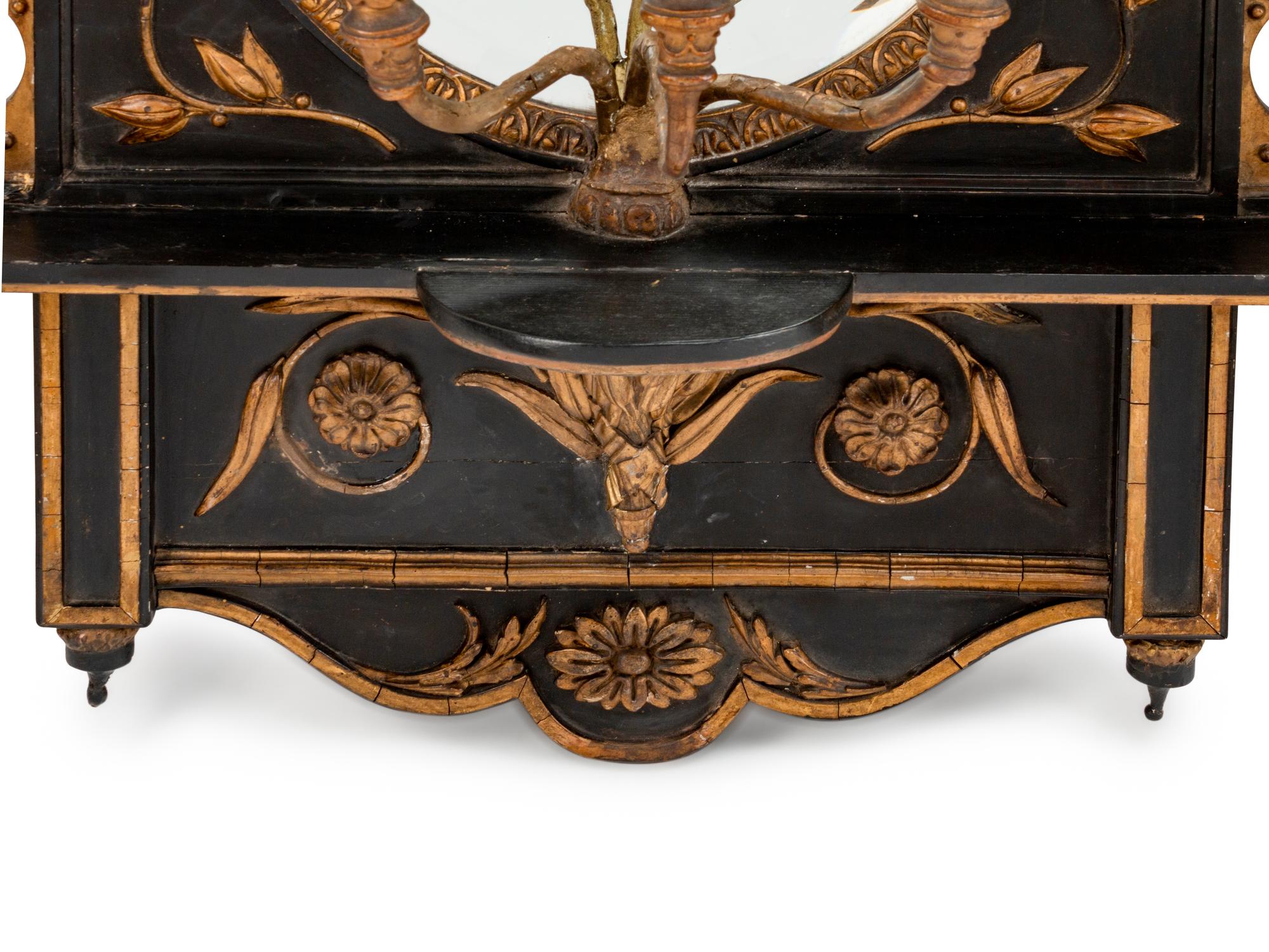 A Pair of English Parcel-Gilt and Ebonized Girandole Mirrors — 19TH CENTURY