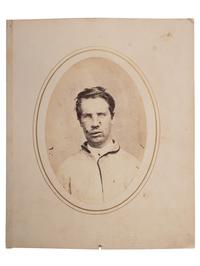 [CIVIL WAR]. Albumen photograph of Private Robert Jenkins, Company E, 6th Regiment, New York Volunteers, wounded Petersburg, Virginia, 25 March 1865, photographed and assembled by Reed Brockway Bontecou, M.D.