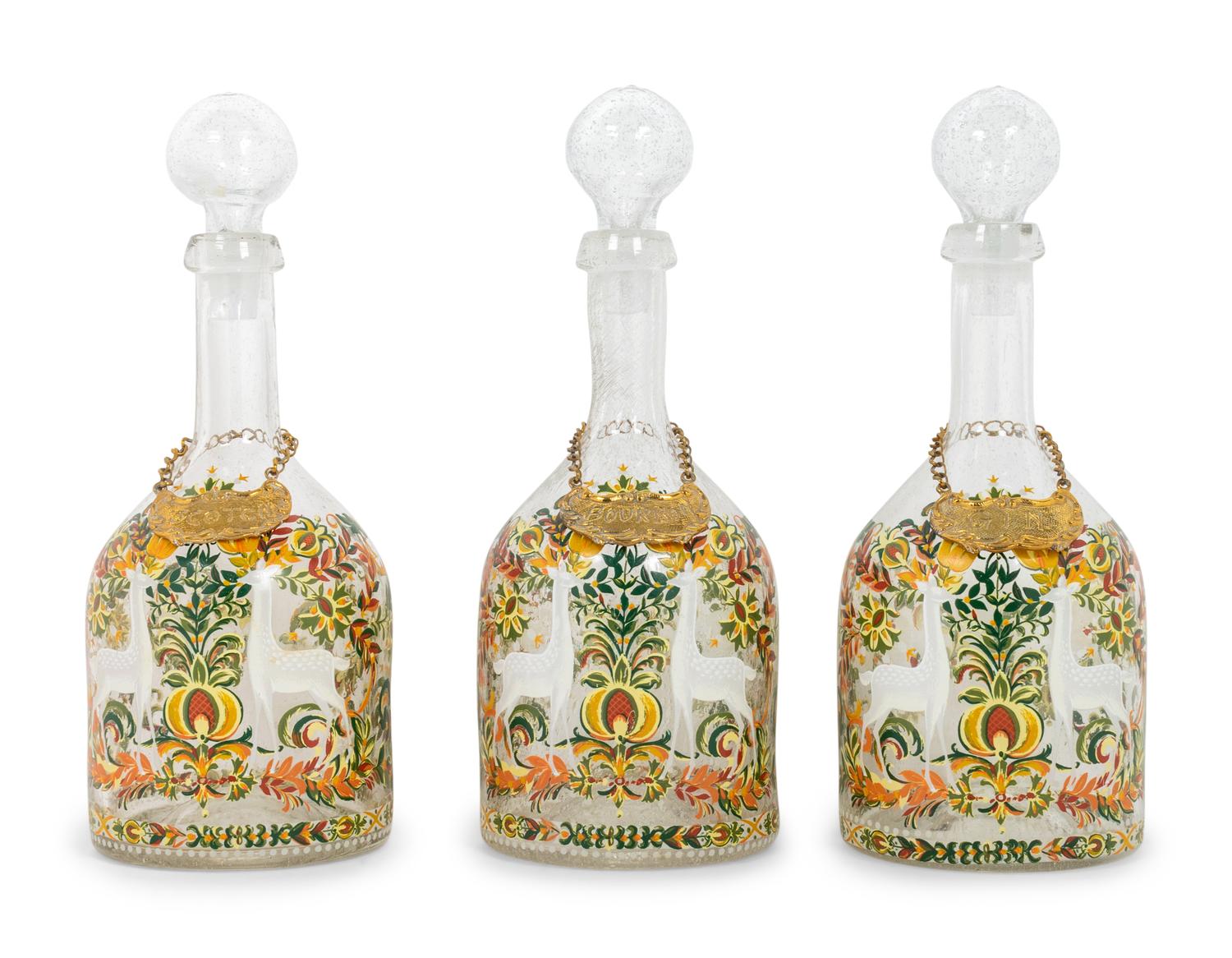 Three German Enameled Glass Decanters