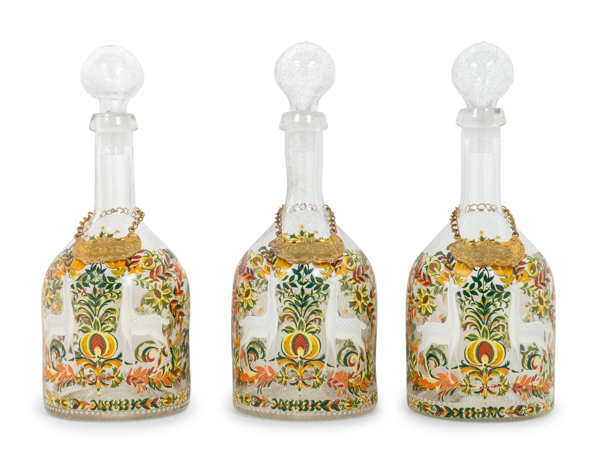 Three German Enameled Glass Decanters