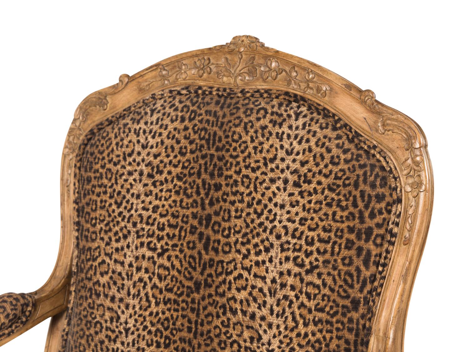 A Pair of Louis XV Style Carved Wood Fauteuils