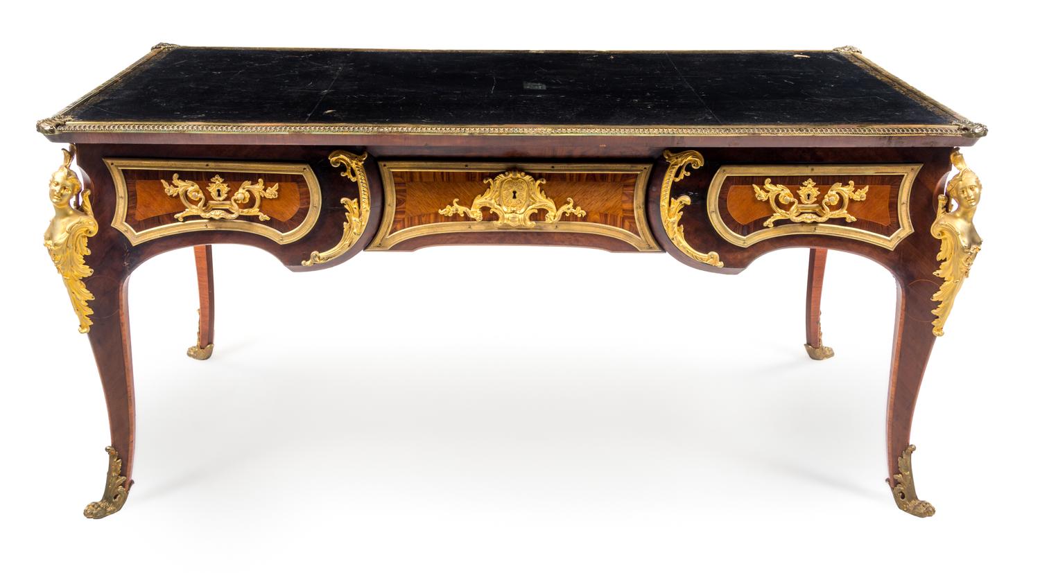 A Louis XV Style Gilt Bronze Mounted Bureau Plat Height 33 x width 70 x depth 37 inches. — AFTER THE MODEL BY CHARLES CRESSENT, EARLY 20TH CENTURY