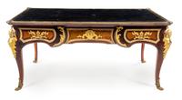 A Louis XV Style Gilt Bronze Mounted Bureau Plat Height 33 x width 70 x depth 37 inches. — AFTER THE MODEL BY CHARLES CRESSENT, EARLY 20TH CENTURY