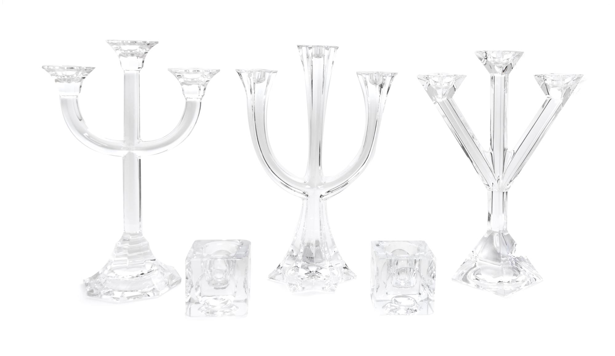 Five Glass Candlesticks and Holders Height of tallest 12 inches.