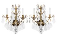 A Pair of French Brass Two-Light Sconces Height 18 3/4 inches.