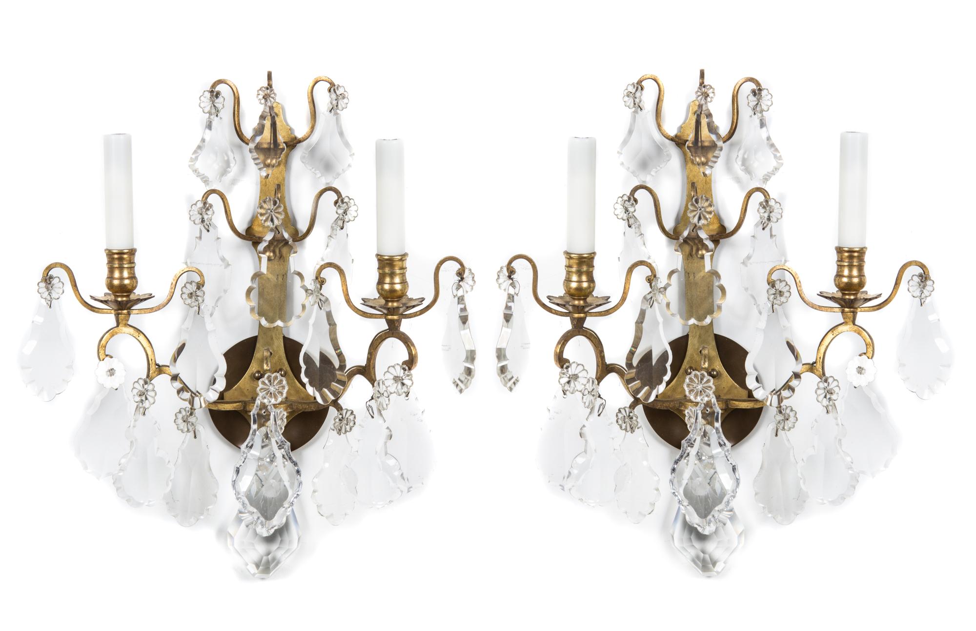 A Pair of French Brass Two-Light Sconces Height 18 3/4 inches.