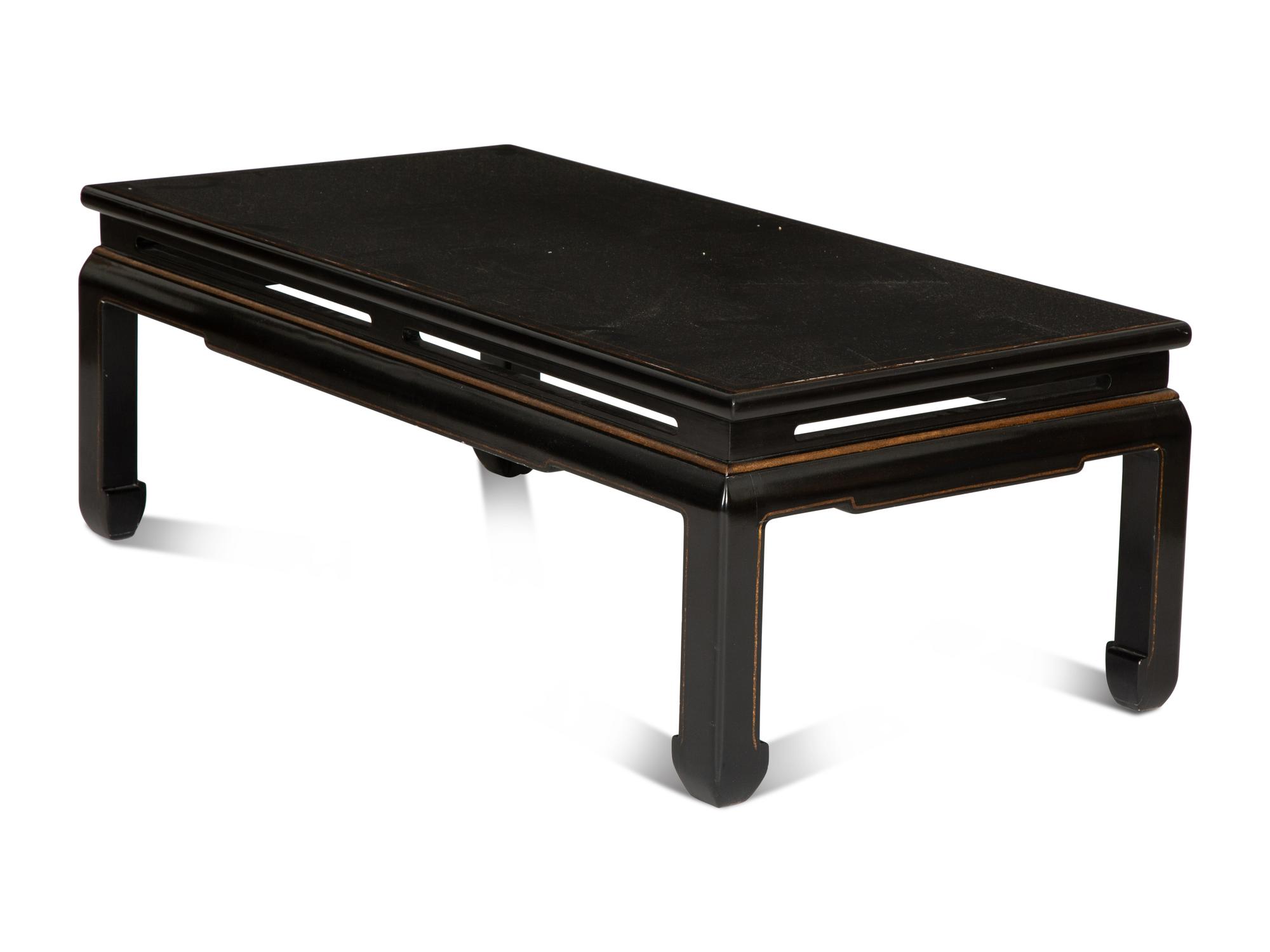 A Chinese Export Ming Style Black and Parcel Gilt Lacquer Low Table