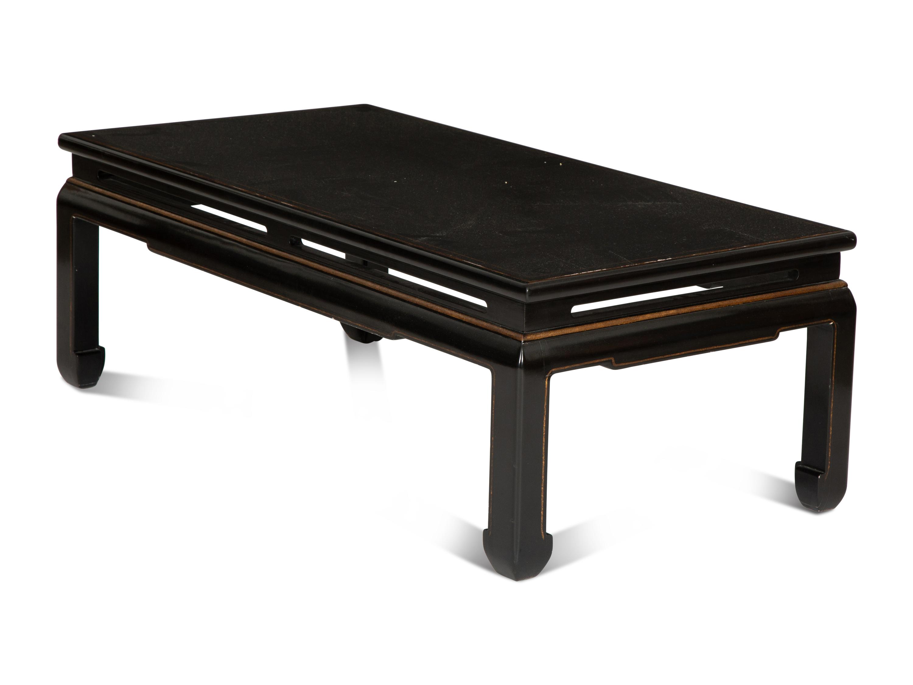A Chinese Export Ming Style Black and Parcel Gilt Lacquer Low Table
