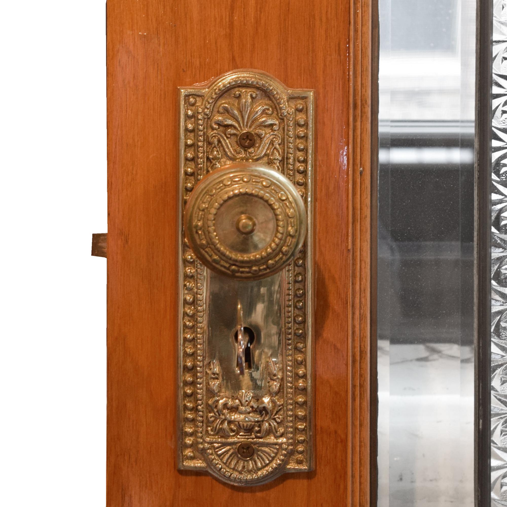 A Pair of Leaded Glass Doors 60" W x 1.75" D x 84" H — United States, Early 20th Century