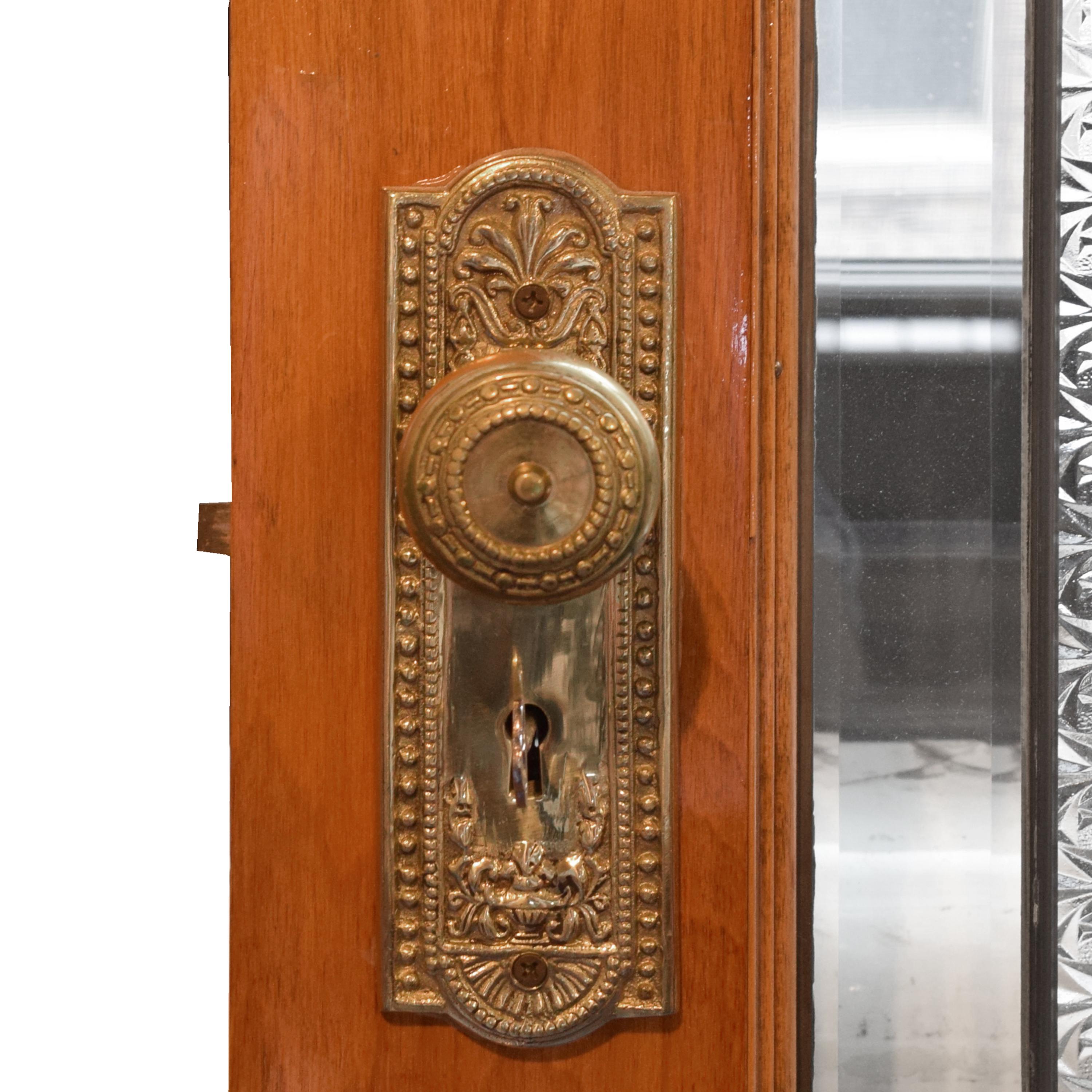 A Pair of Leaded Glass Doors 60" W x 1.75" D x 84" H — United States, Early 20th Century