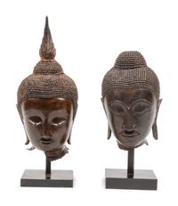 A Group of Two Southeast Asian Bronze Deity Heads