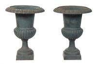 A Pair of Cast Iron Garden Urns Height 30 1/2 inches.