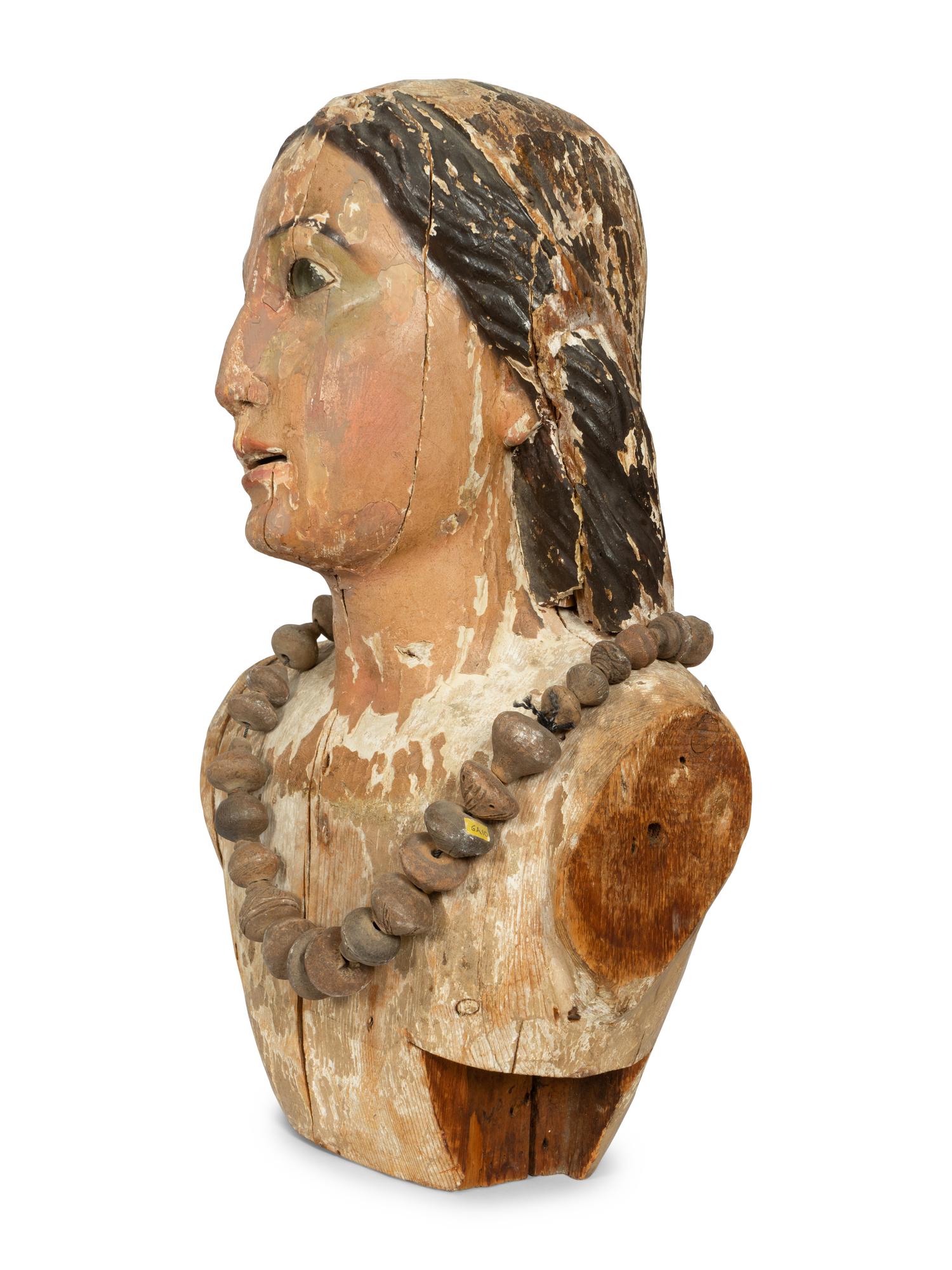 A Continental Carved and Painted Bust of a Saint