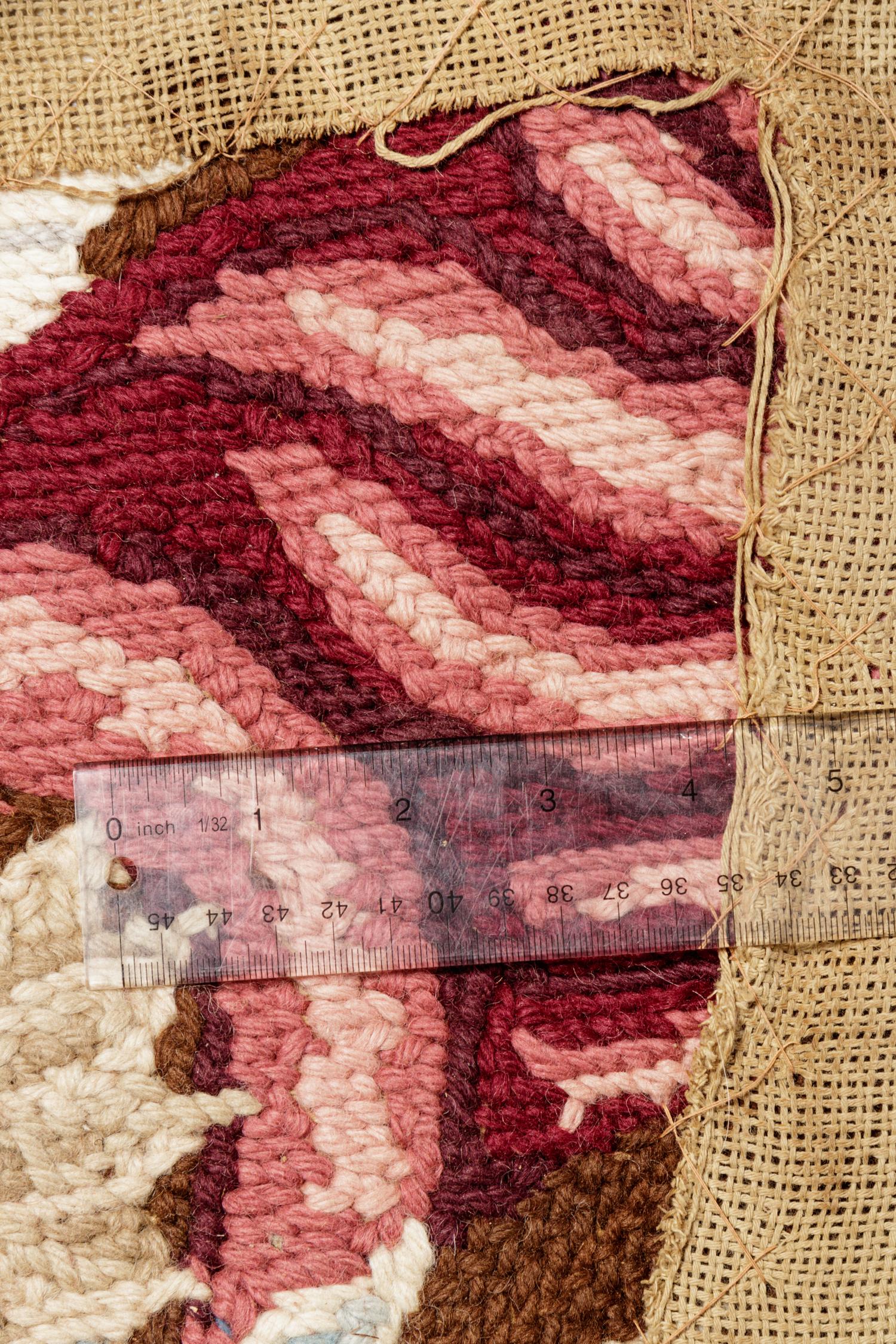 A Continental Needlepoint Rug