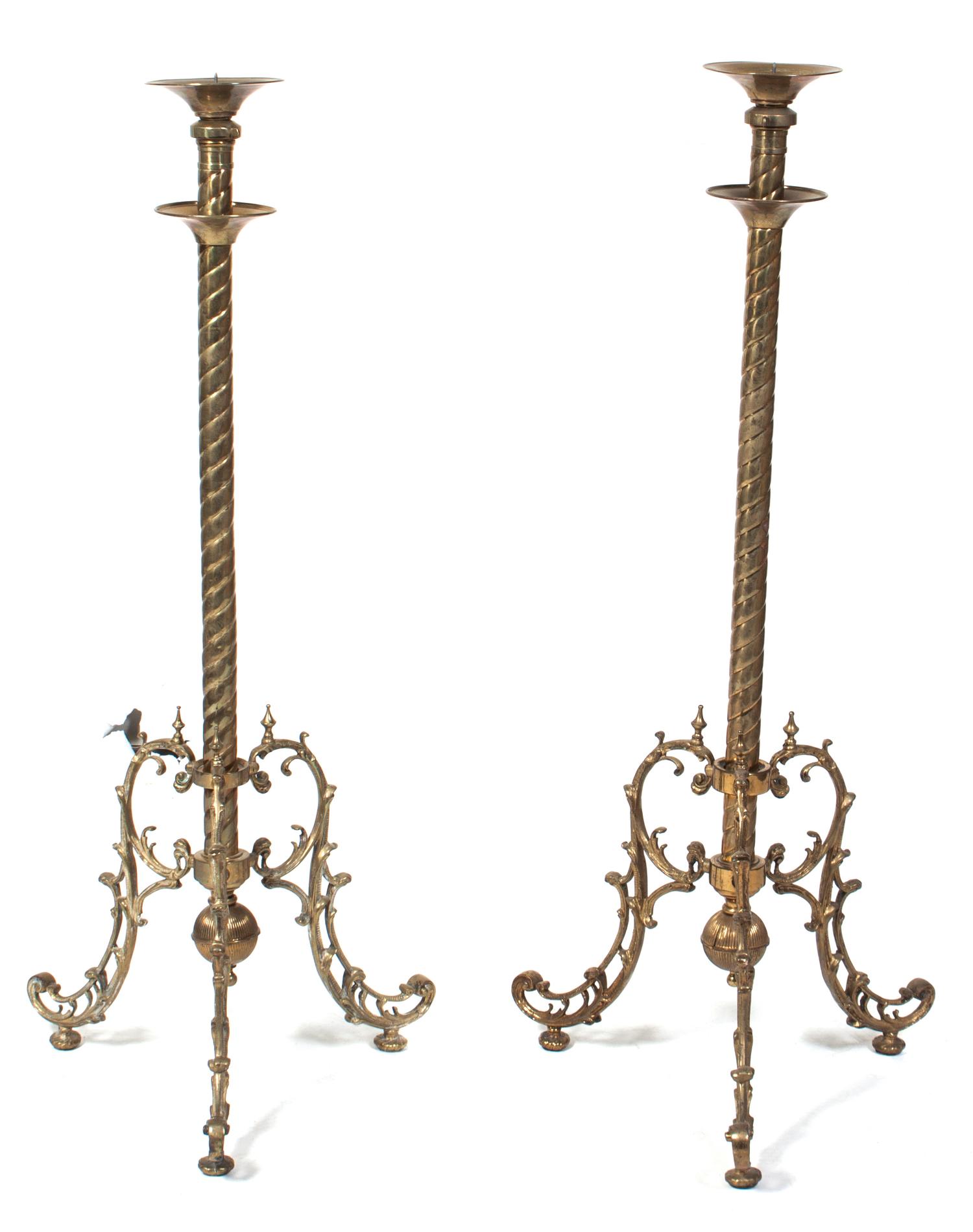 A Pair of Brass Pricket Sticks Height approximately 40 inches. — 20TH CENTURY