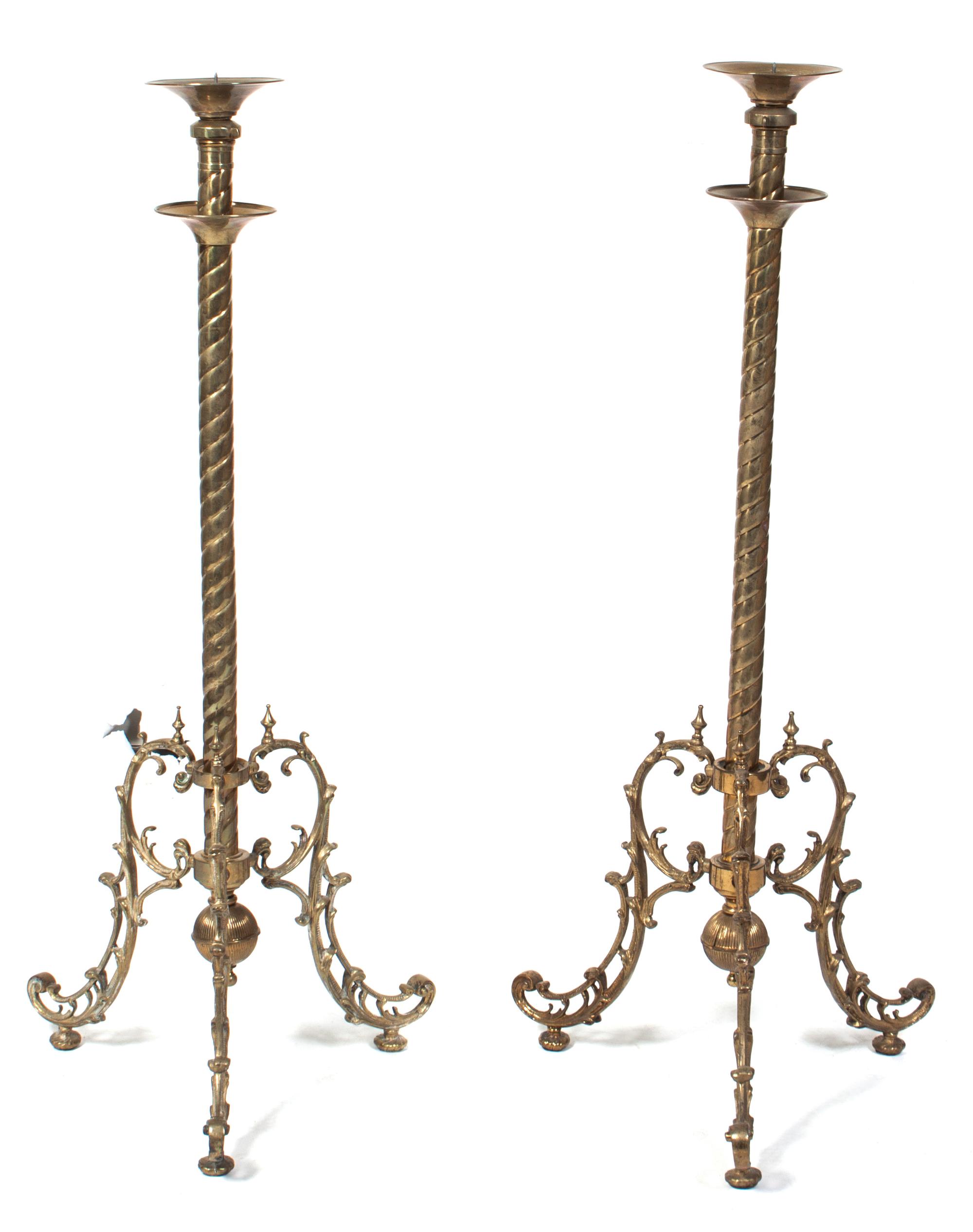 A Pair of Brass Pricket Sticks Height approximately 40 inches. — 20TH CENTURY