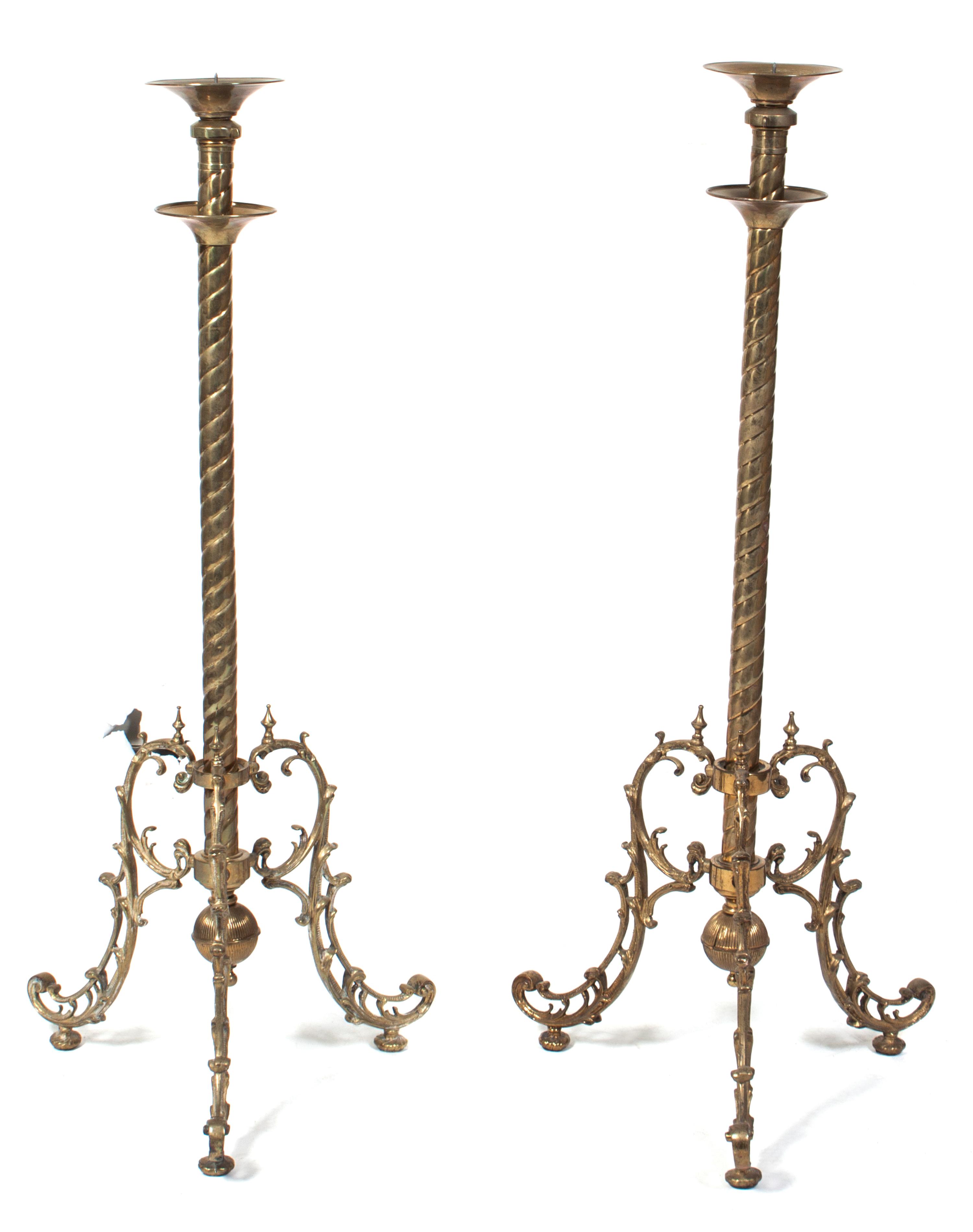 A Pair of Brass Pricket Sticks Height approximately 40 inches. — 20TH CENTURY