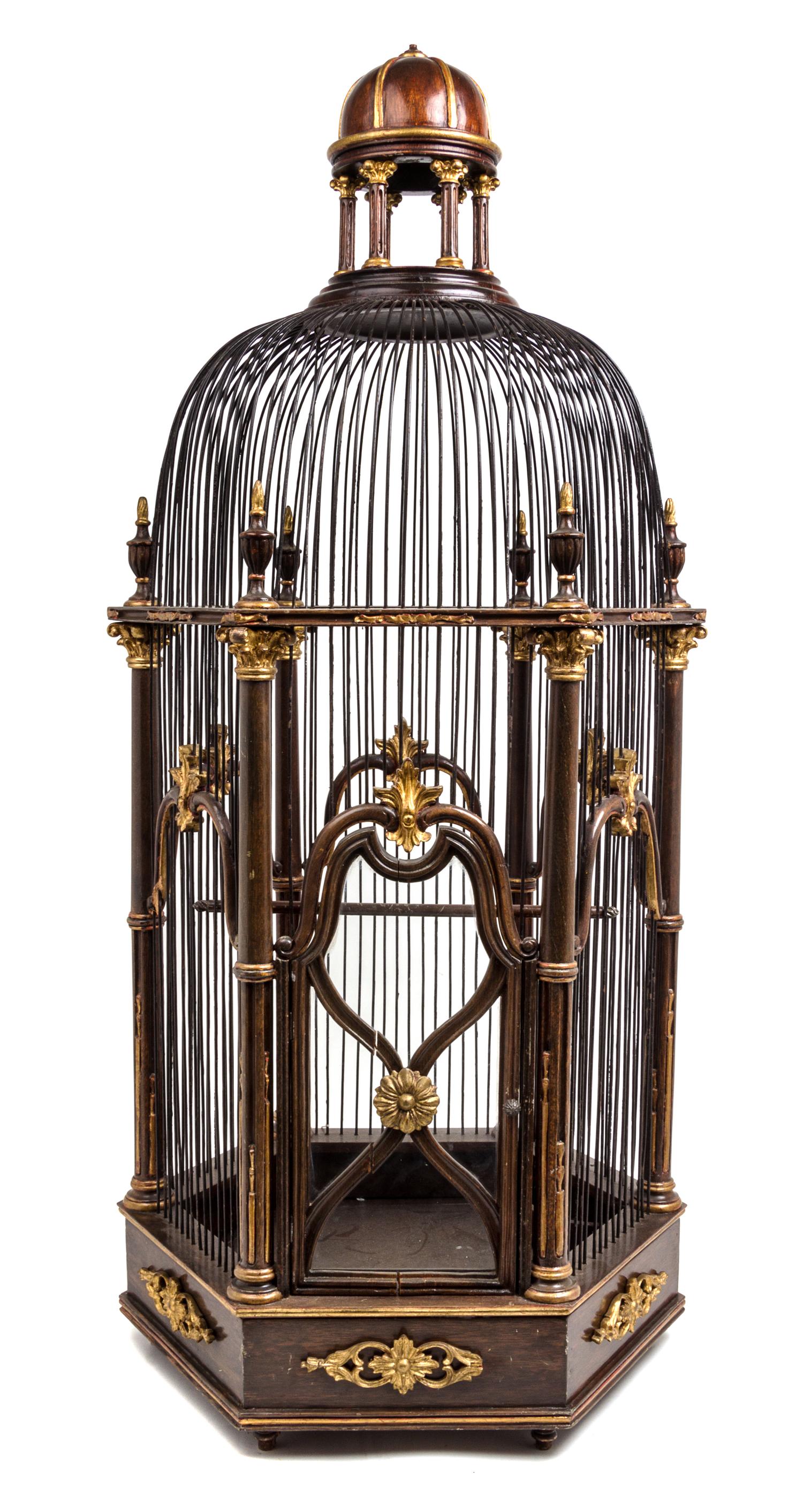 A Continental Parcel Gilt Mahogany Birdcage Height 41 3/8 inches.