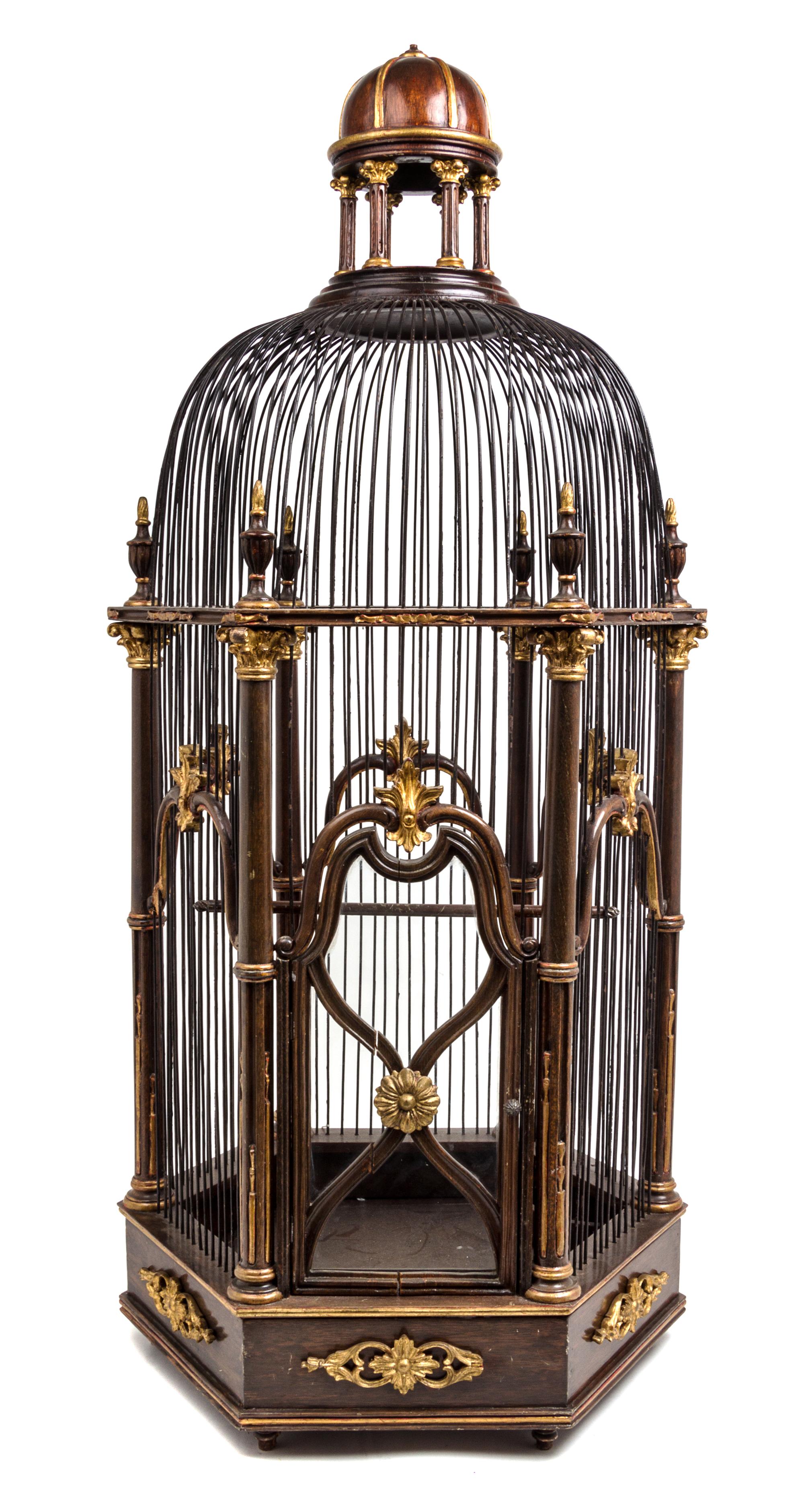 A Continental Parcel Gilt Mahogany Birdcage Height 41 3/8 inches.