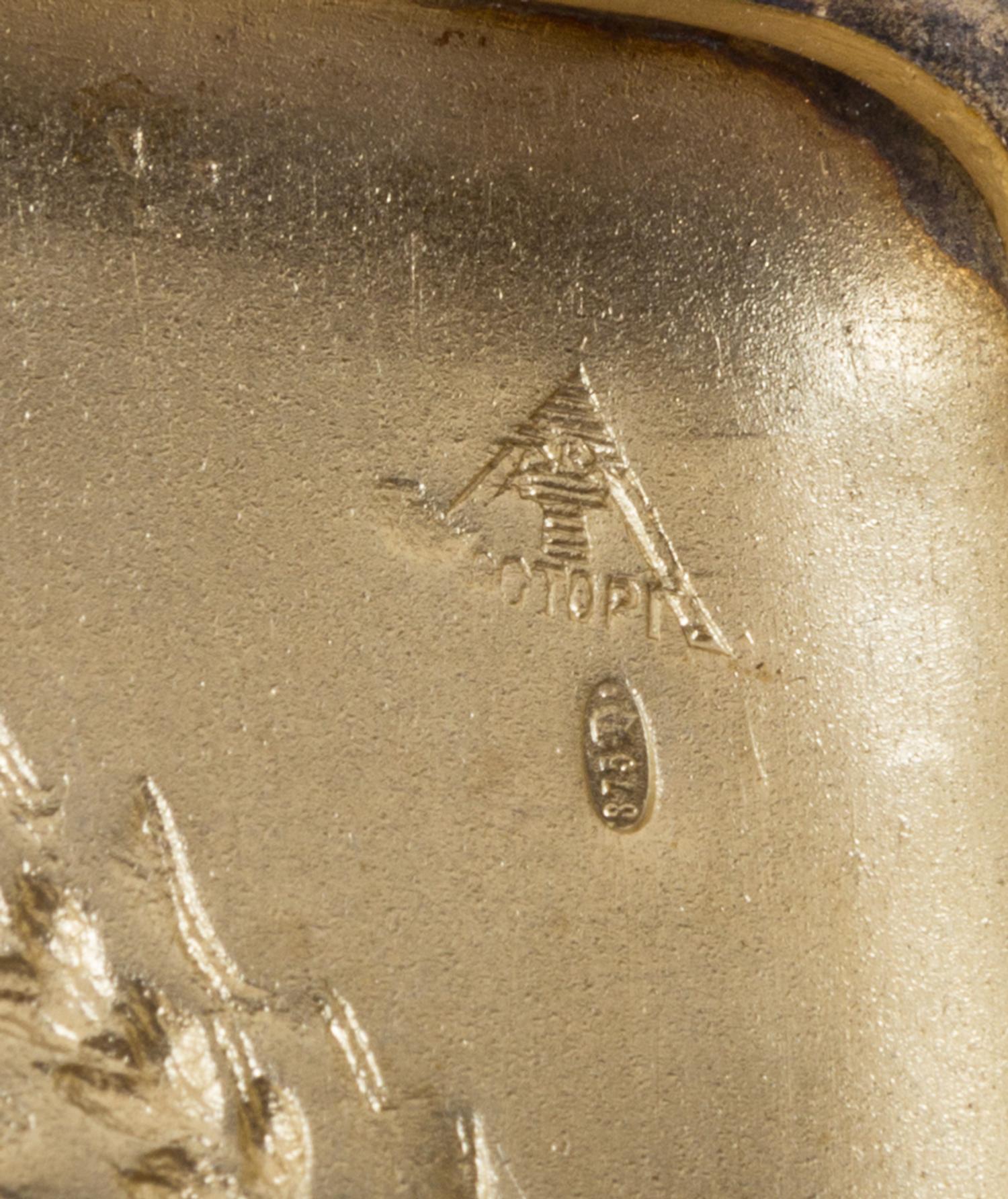 A Russian Silver Cigarette Case, Retailed by Mostorg, Moscow, 20th century, the lid worked with the seal of the Soviet Union above an i