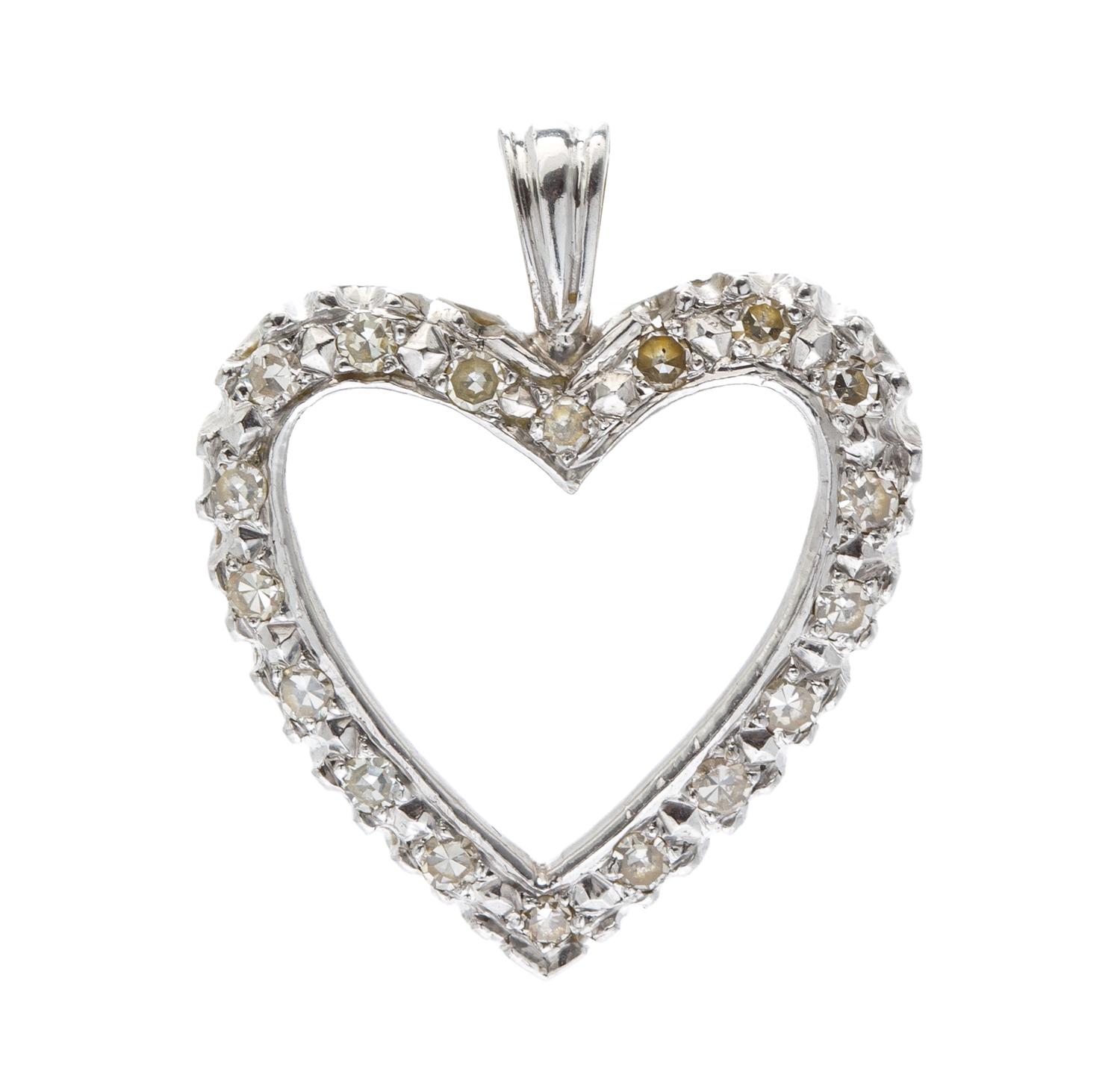 A White Gold and Diamond Heart Pendant Necklace, 1.40 dwts.