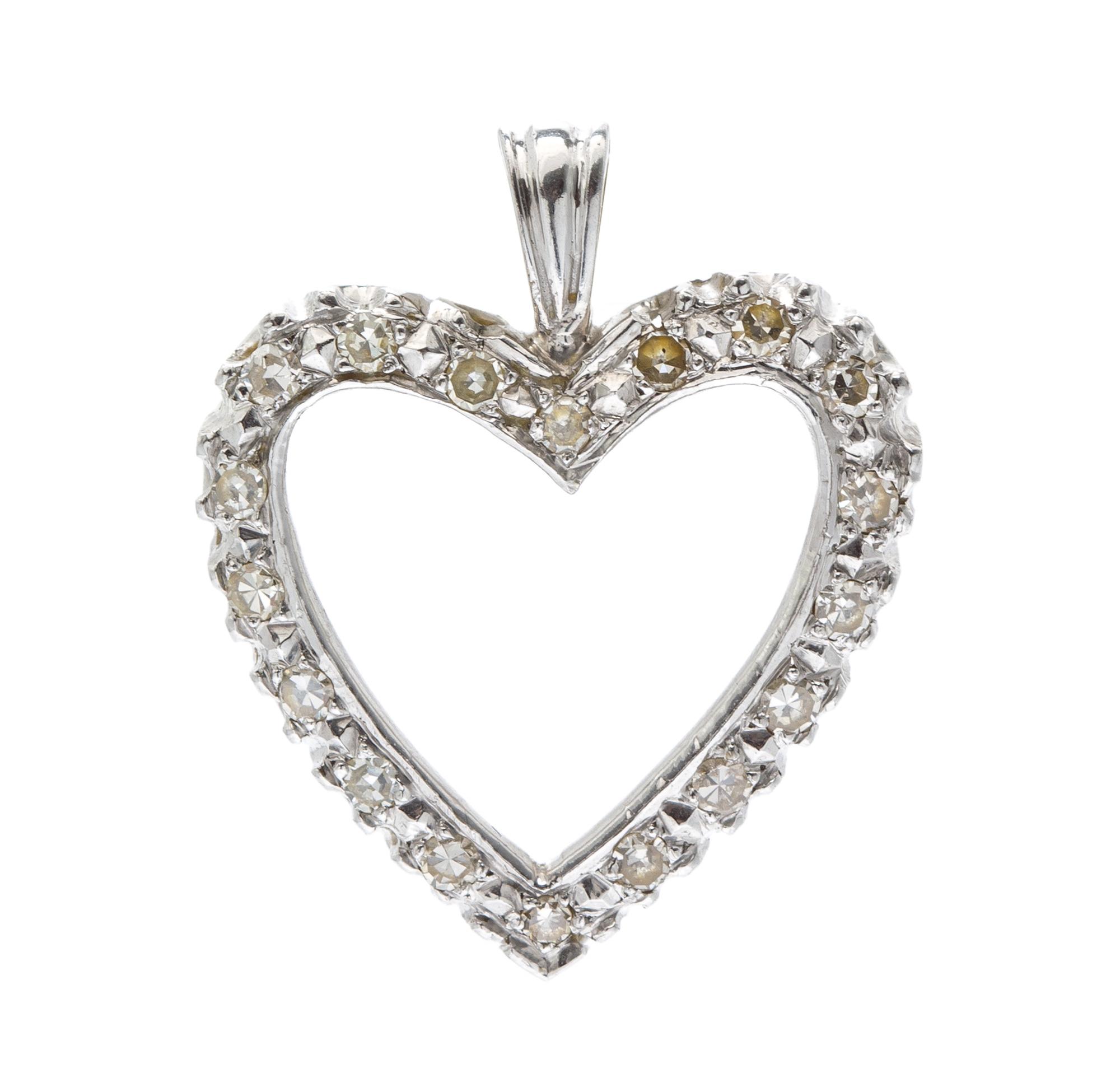 A White Gold and Diamond Heart Pendant Necklace, 1.40 dwts.