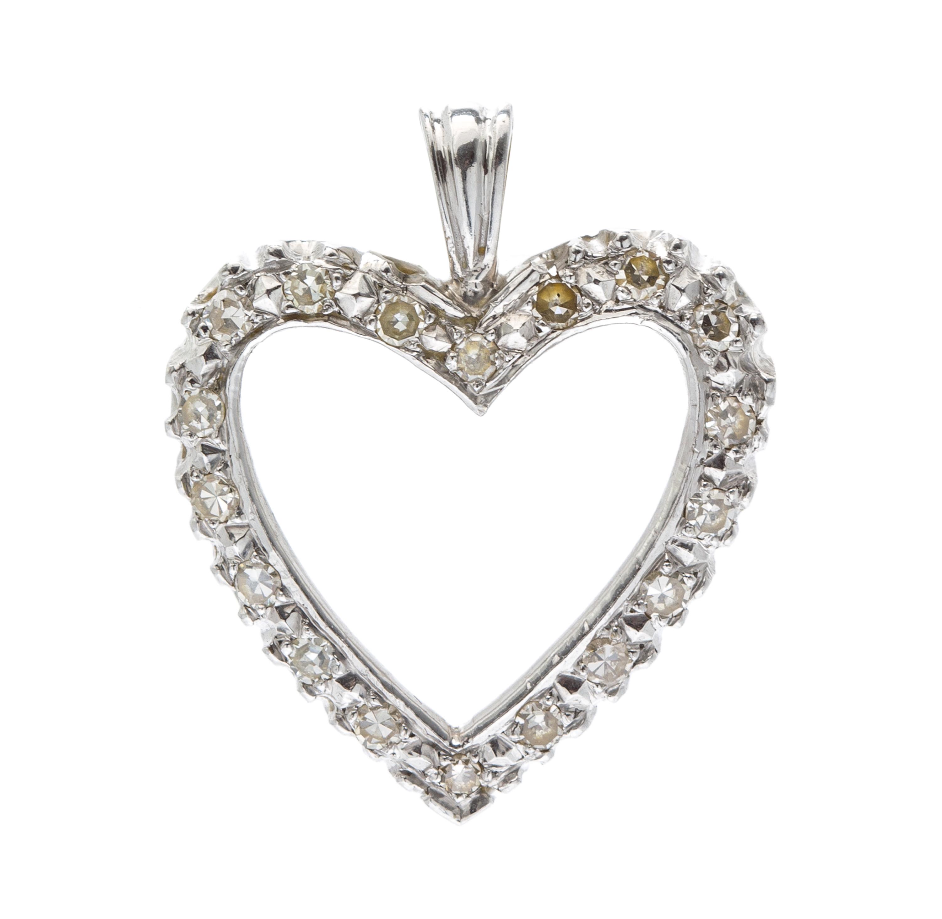 A White Gold and Diamond Heart Pendant Necklace, 1.40 dwts.