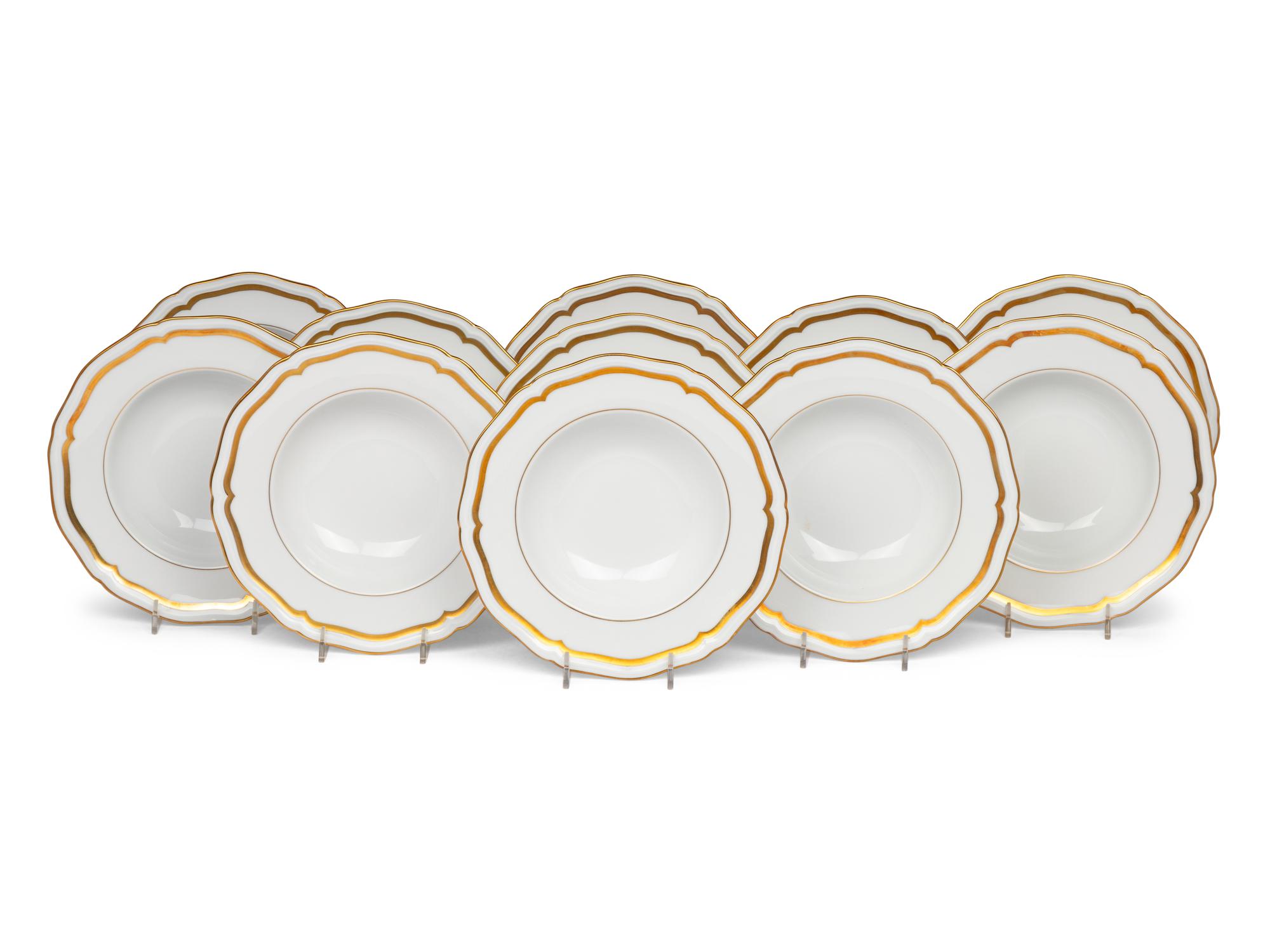 A Set of Twelve Raynaud Limoges Marie Antoinette Porcelain Soup Bowls
