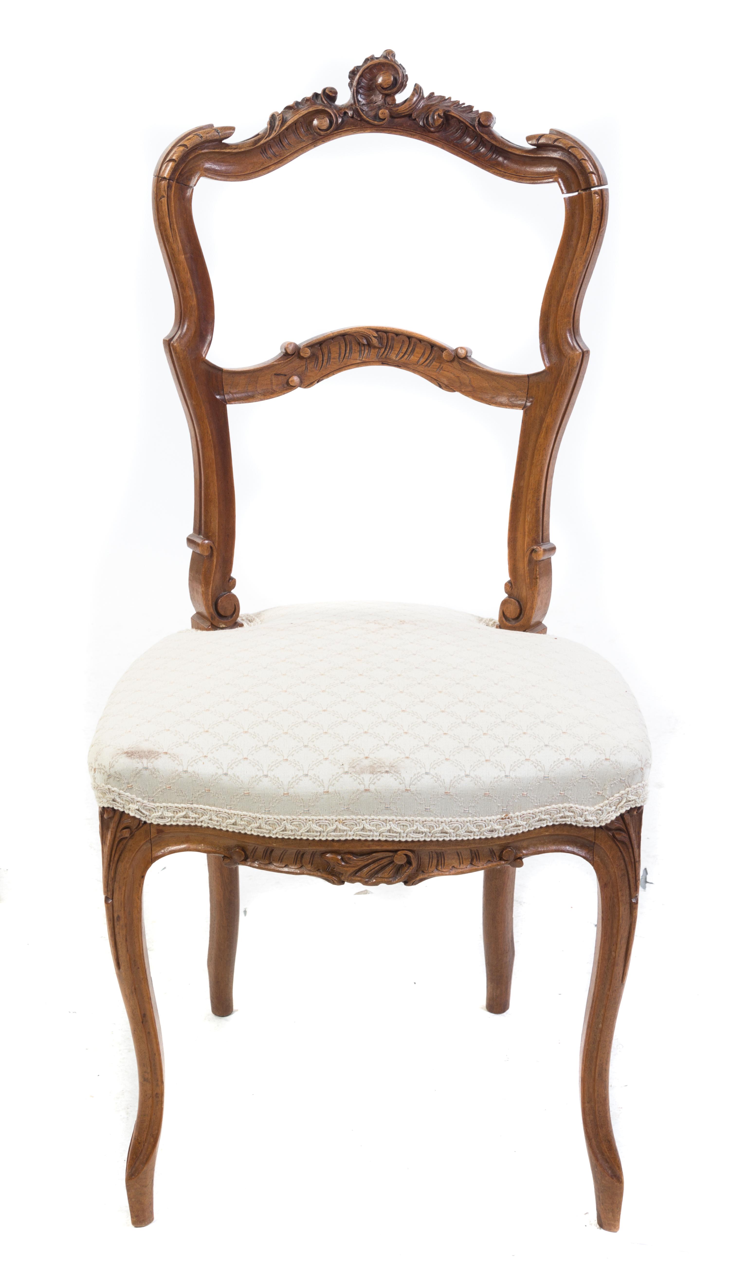A Victorian Walnut Side Chair Height 37 1/4 inches. — 19TH CENTURY