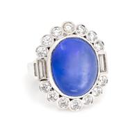 A White Gold, Star Sapphire and Diamond Ring, 17.00 dwts.