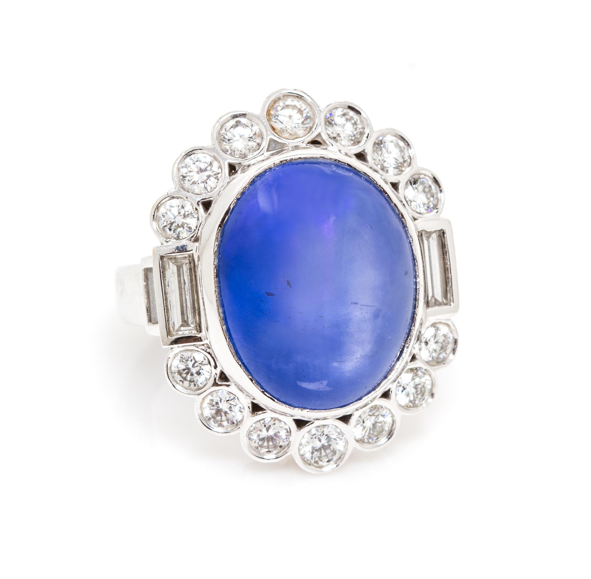 A White Gold, Star Sapphire and Diamond Ring, 17.00 dwts.