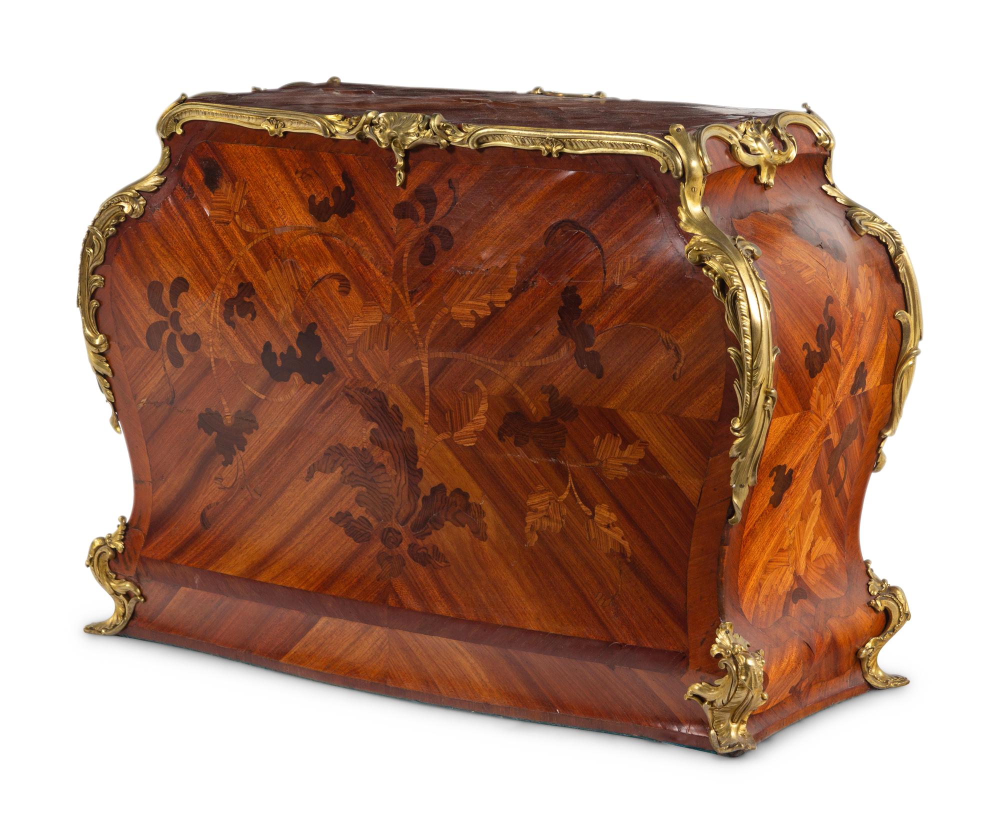 A Louis XV Style Gilt Bronze Mounted Bois Satiné and Marquetry Chest