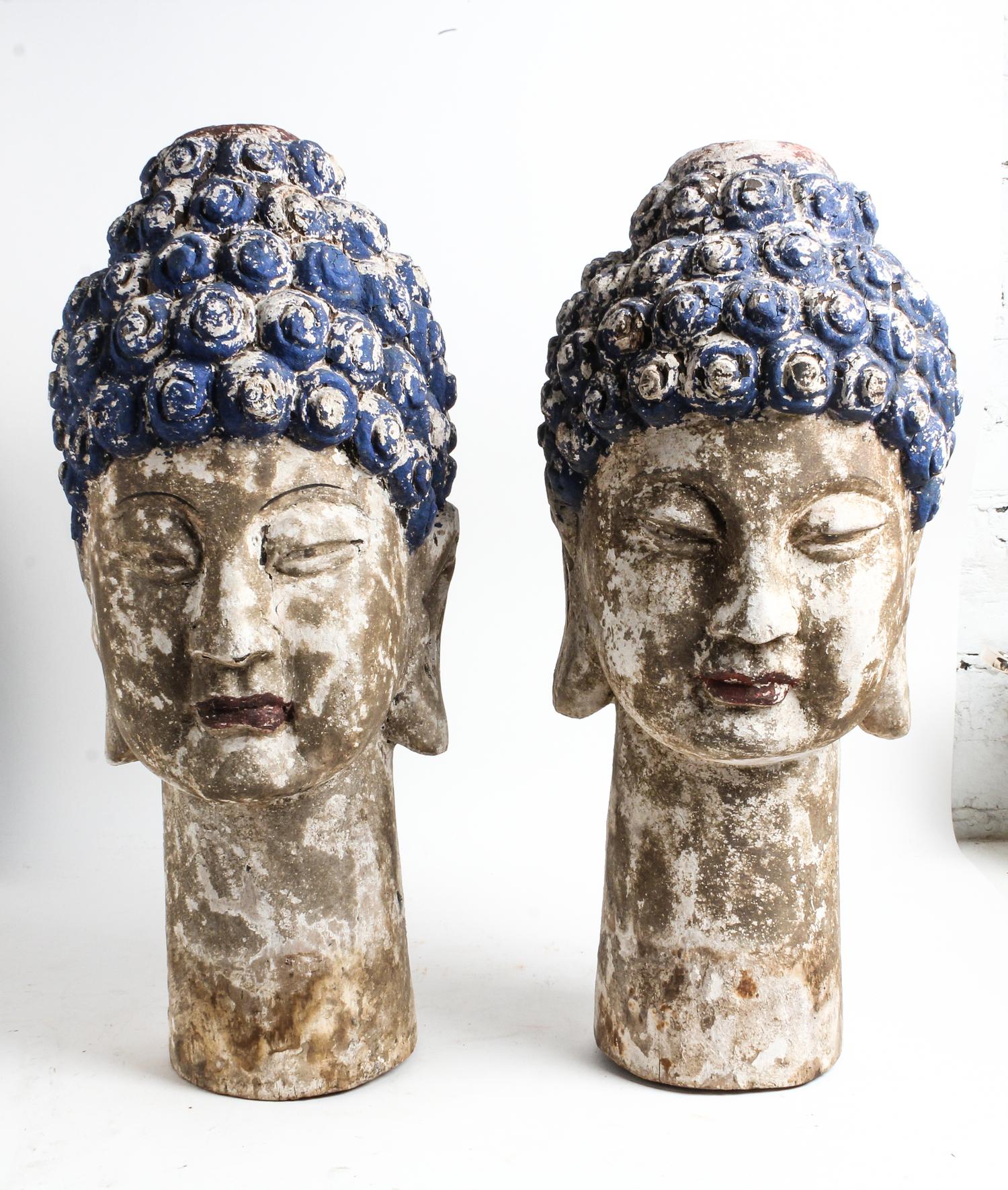A Pair of Southeast Asian Painted Wood Heads of Buddha Height 25 inches. — POSSIBLY INDONESIAN