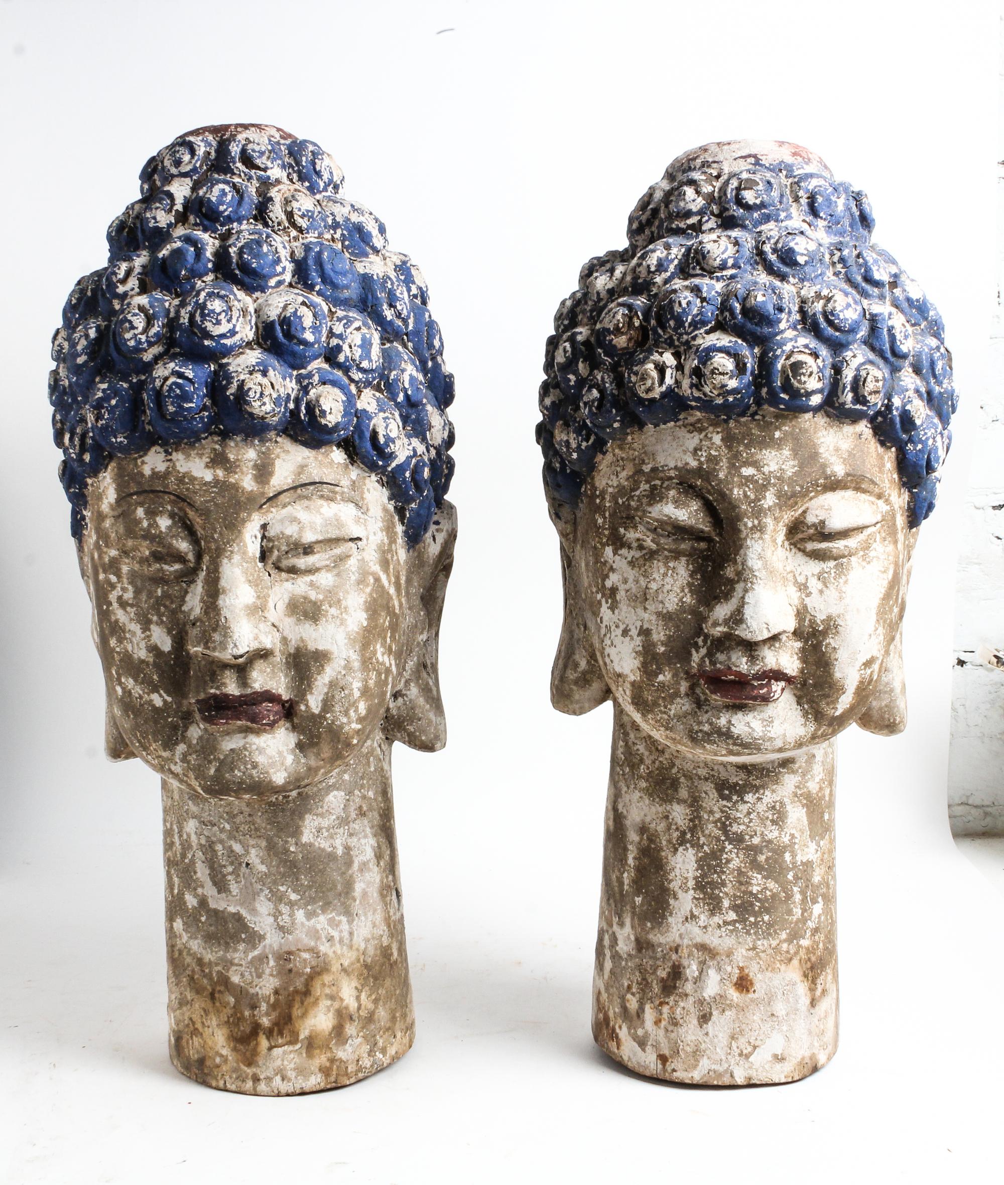 A Pair of Southeast Asian Painted Wood Heads of Buddha Height 25 inches. — POSSIBLY INDONESIAN