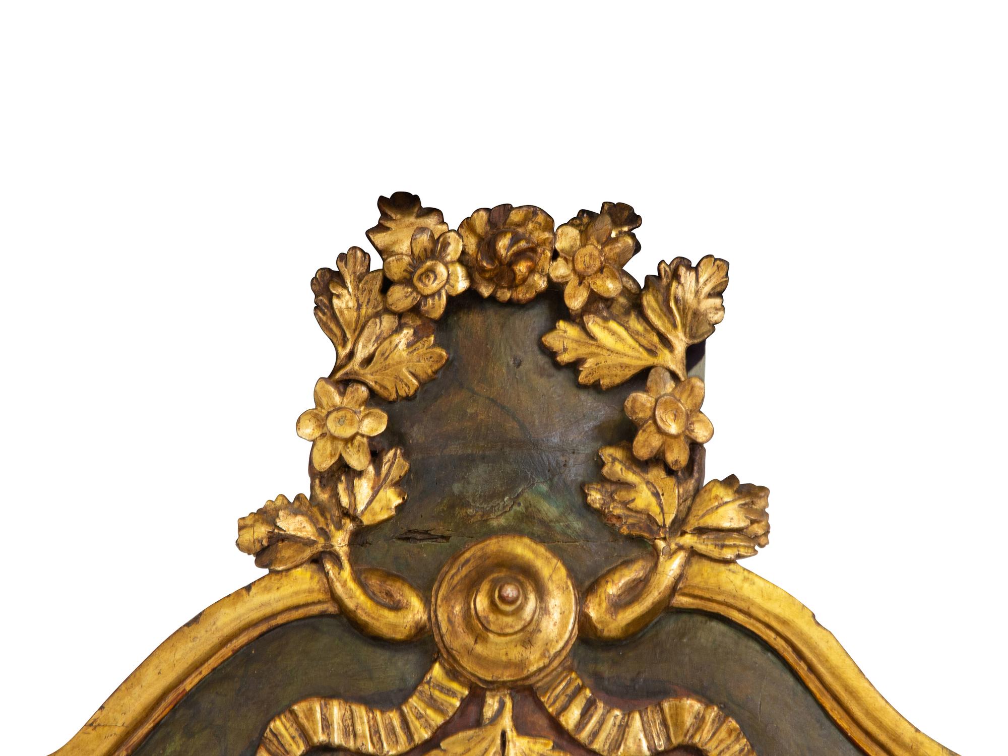 An Italian Painted and Parcel Gilt Mirror